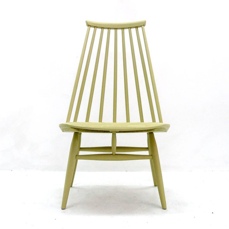 Iconic 'Mademoiselle' chair designed by Illmari Tapiovaara for Edsby-verken, Sweden, with unique bentwood seats and curved backrest, original pale chartreuse finish, marked with sticker to the underside.