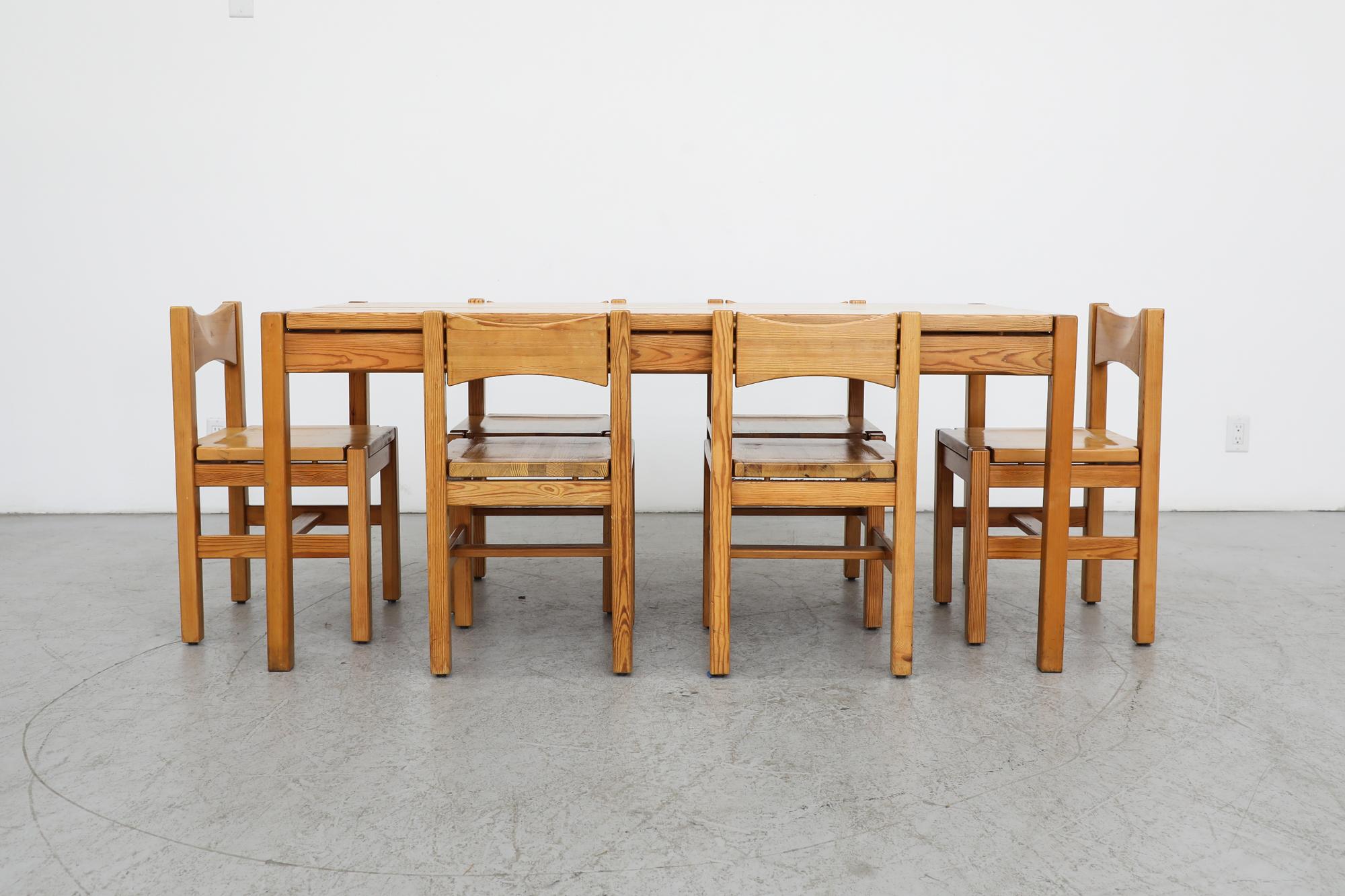 Mid-Century, Ilmari Tapiovaara designed, seven piece pine dining set. Manufactured in the early to mid 1960s for Laukaan Puu. Large dining or conference table with six matching pine chairs. The chairs measure: 16