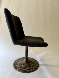 Ilmari Tapiovaara Pedestal/Swivel Chair. Cast iron Base.
