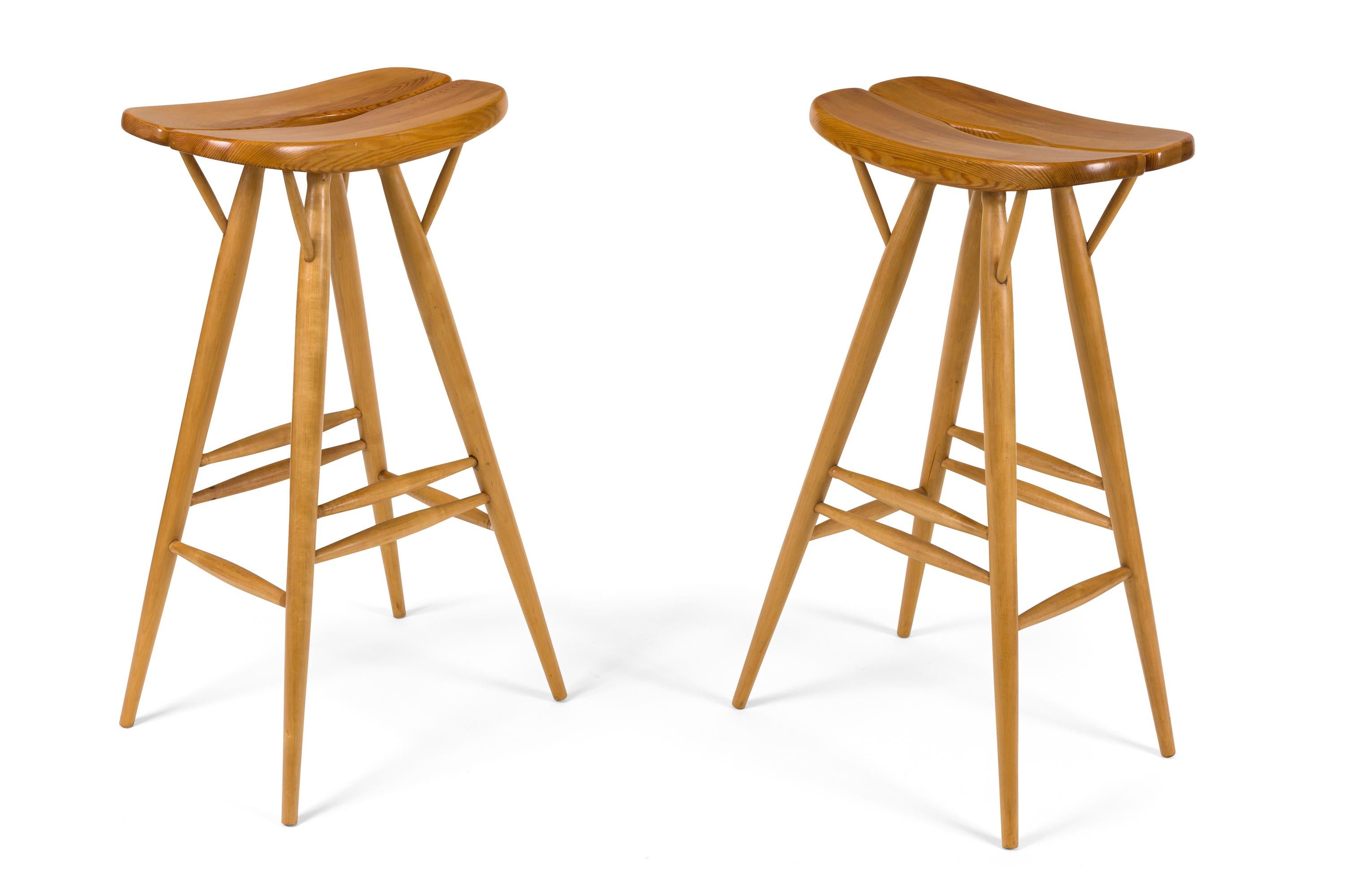 A set of rare early Pirkka barstools by Ilmari Tapiovaara. Over his lifetime Tapiovaara won a total of six gold medals at the Milan Triennale in addition to many other prestigious architecture and design awards.