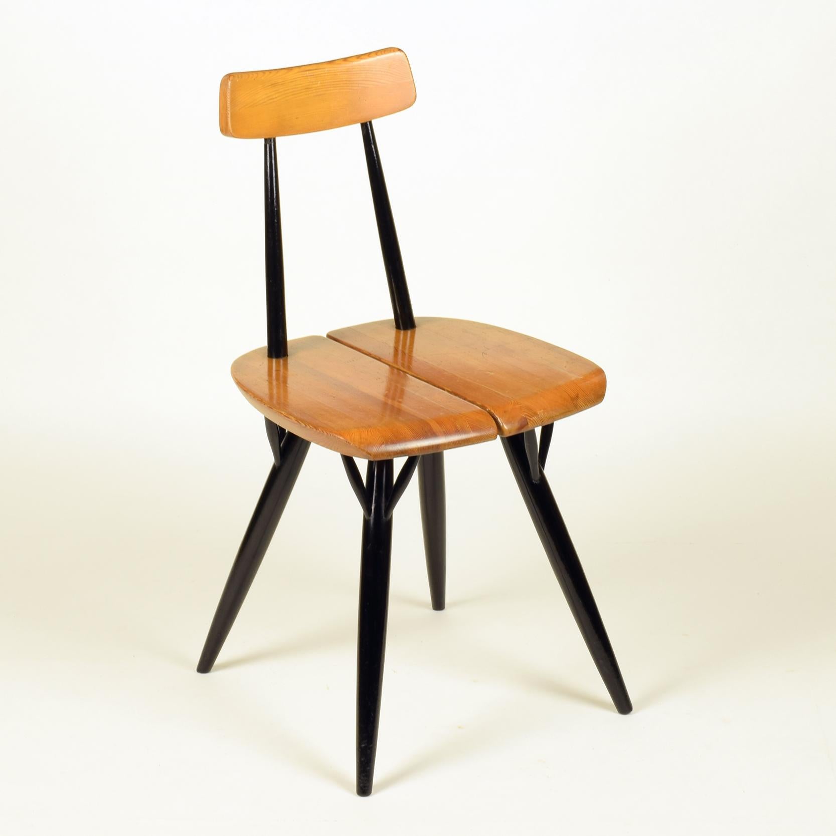 Ilmari Tapiovaara

Laukaan Puu (manufacturer), Finland

'Pirkka' side chair, 1955

Pinewood and black lacquered.
Logo and Manufacturer's / Designer's details stamped to underside.

A lovely example of this elegant chair, in original and