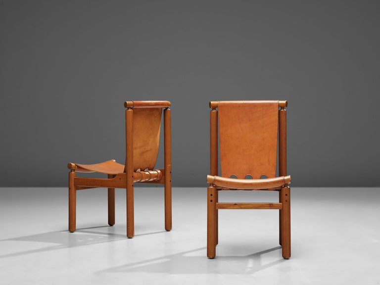 Ilmari Tapiovaara Set of Eight Dining Chairs in Cognac Leather at 1stDibs
