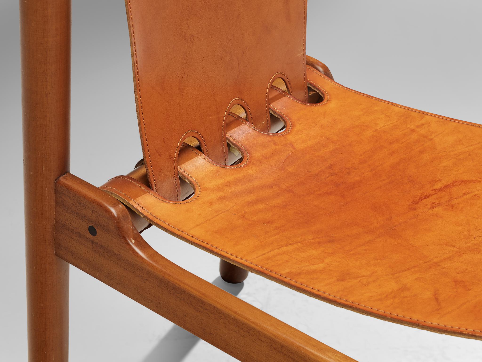Mid-Century Modern Ilmari Tapiovaara Set of Eight Dining Chairs in Cognac Leather