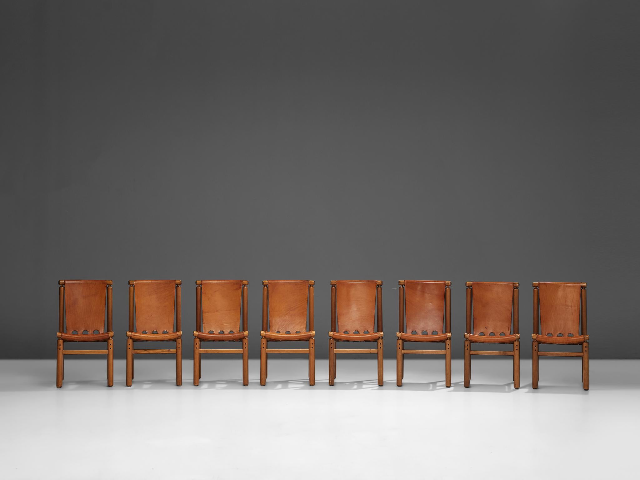Mid-20th Century Ilmari Tapiovaara Set of Eight Dining Chairs in Cognac Leather