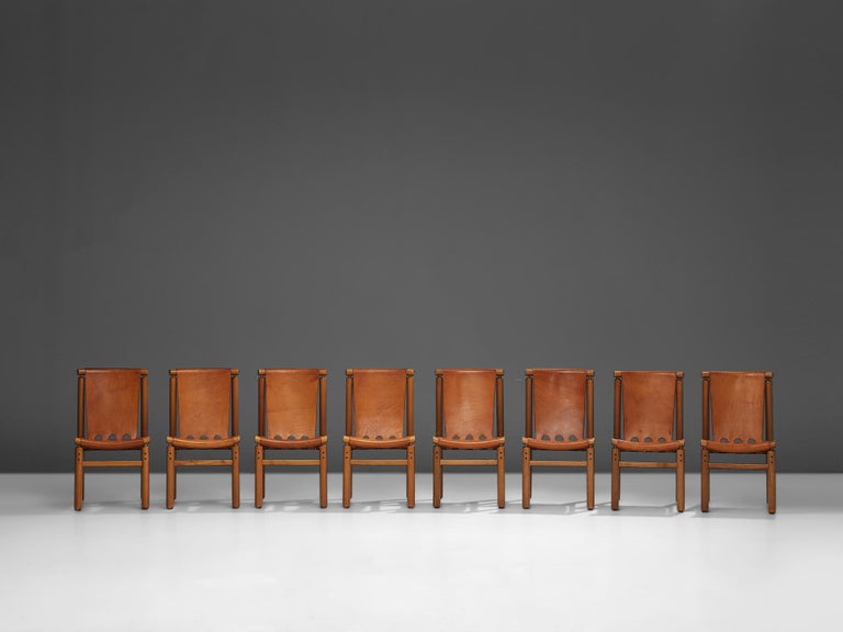 Ilmari Tapiovaara Set of Eight Dining Chairs in Cognac Leather at 1stDibs