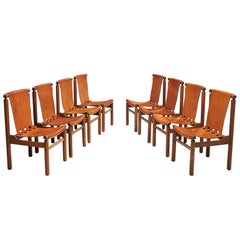 Ilmari Tapiovaara Set of Eight Dining Chairs in Cognac Leather