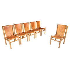 Ilmari Tapiovaara - Ensemble de six chaises de salle à manger en cuir cognac, Finlande, années 1960
