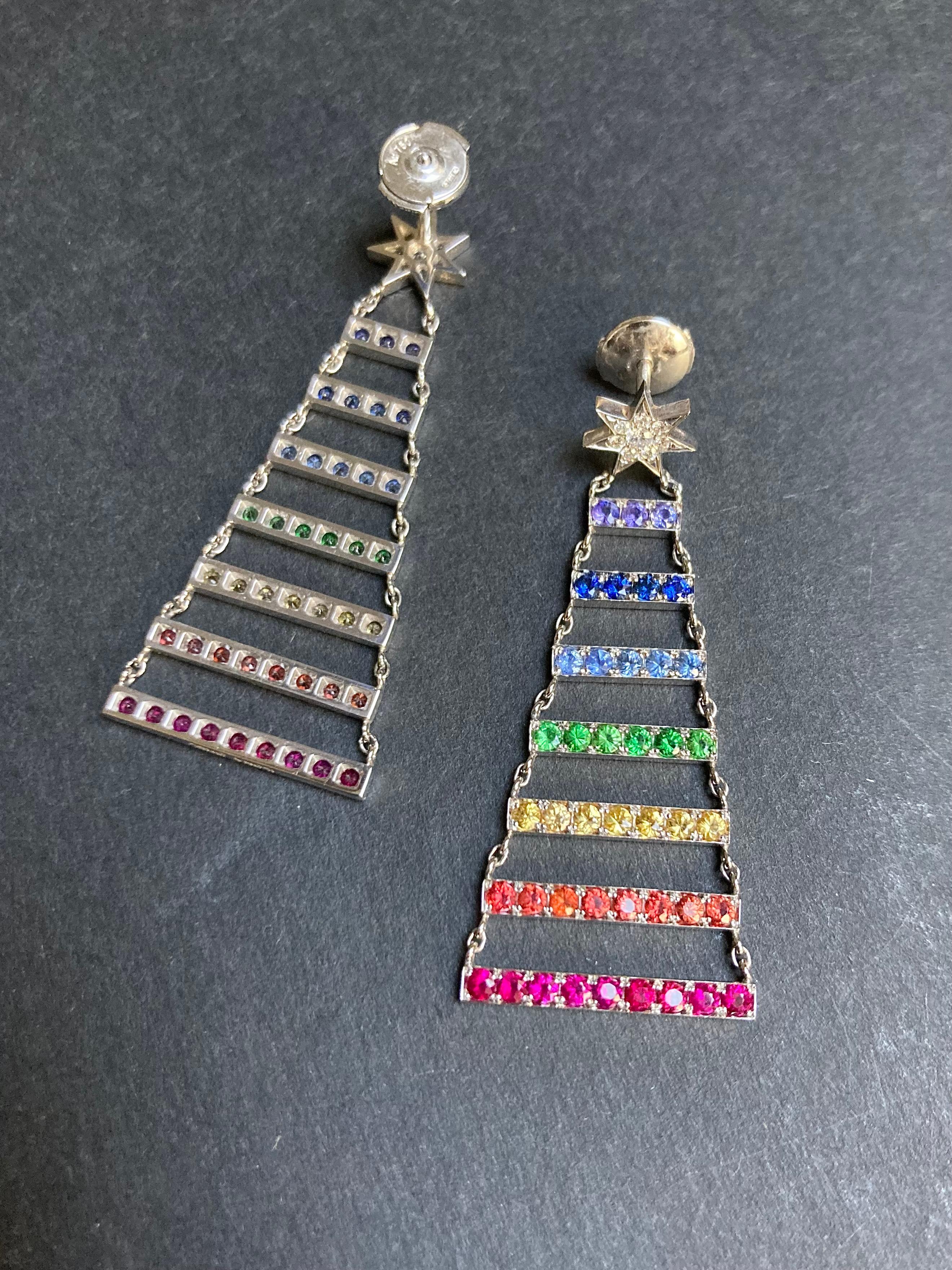 Beautifully crafted Earrings Heaven's Ladder in White gold 18k set with excellent quality Rainbow Sapphires multi color, rubies and white diamonds.
 Leight 5 cm  
Each piece of Ilona Orel jewelry handmade in Paris according to traditional french