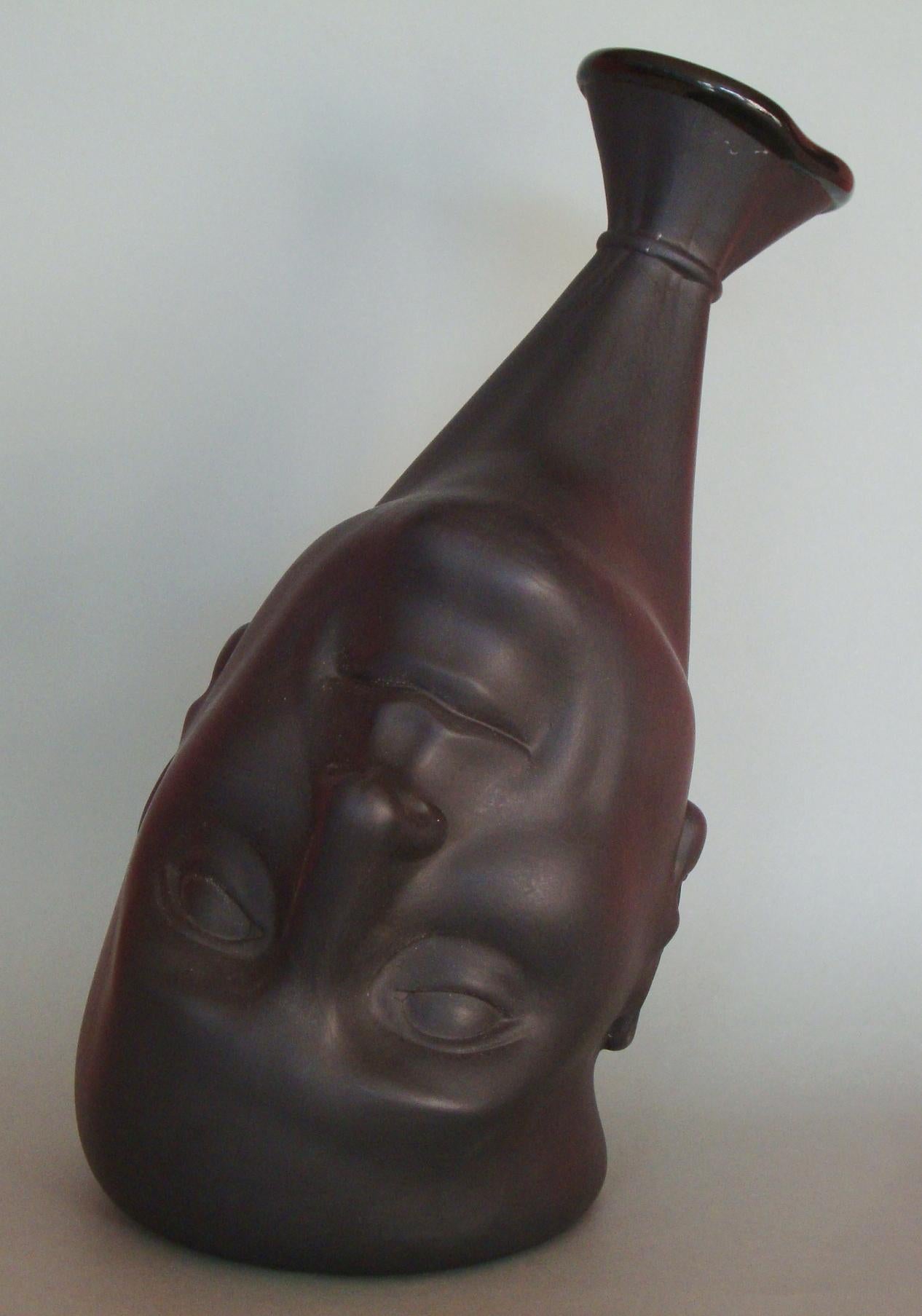 Ilona Romule Figurative Sculpture - Vase. A man's head (black)  Porcelain, h 24 cm 