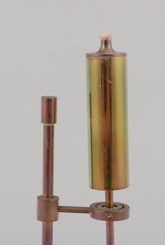 Ilse Ammundsen, porta-cerosene in ottone. Design danese. Metà del XX secolo.