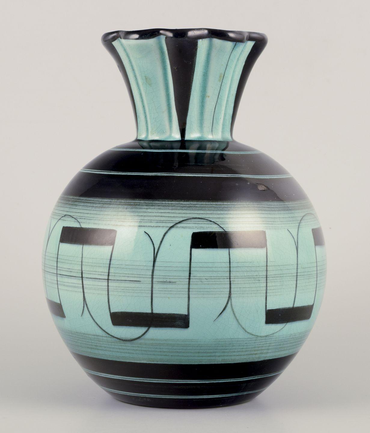 PRE-OWNED GOODS ARE EXEMPT FROM IMPORT TARIFFS FOR U.S., UK, AUSTRALIAN & CANADIAN CUSTOMERS.   
THEREFORE, NO IMPORT TARIFFS WILL BE APPLICABLE TO YOUR PURCHASE. 

Ilse Claesson for Rörstrand.
Large Art Deco faience vase.
Date: approx.