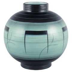 Ilse Claesson for Rörstrand, Sweden. Large, round vase in glazed faience.