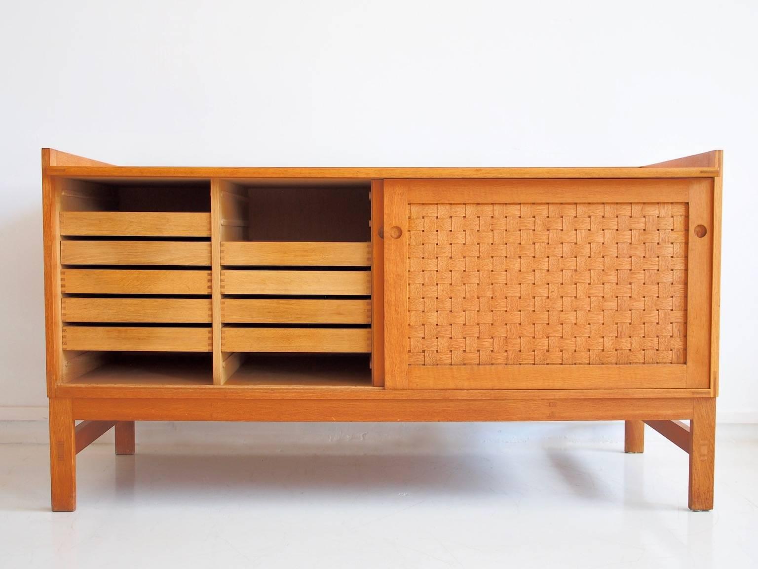 Scandinavian Modern Ilse Rix Oak Sideboard by Uldum with Woven Sliding Doors
