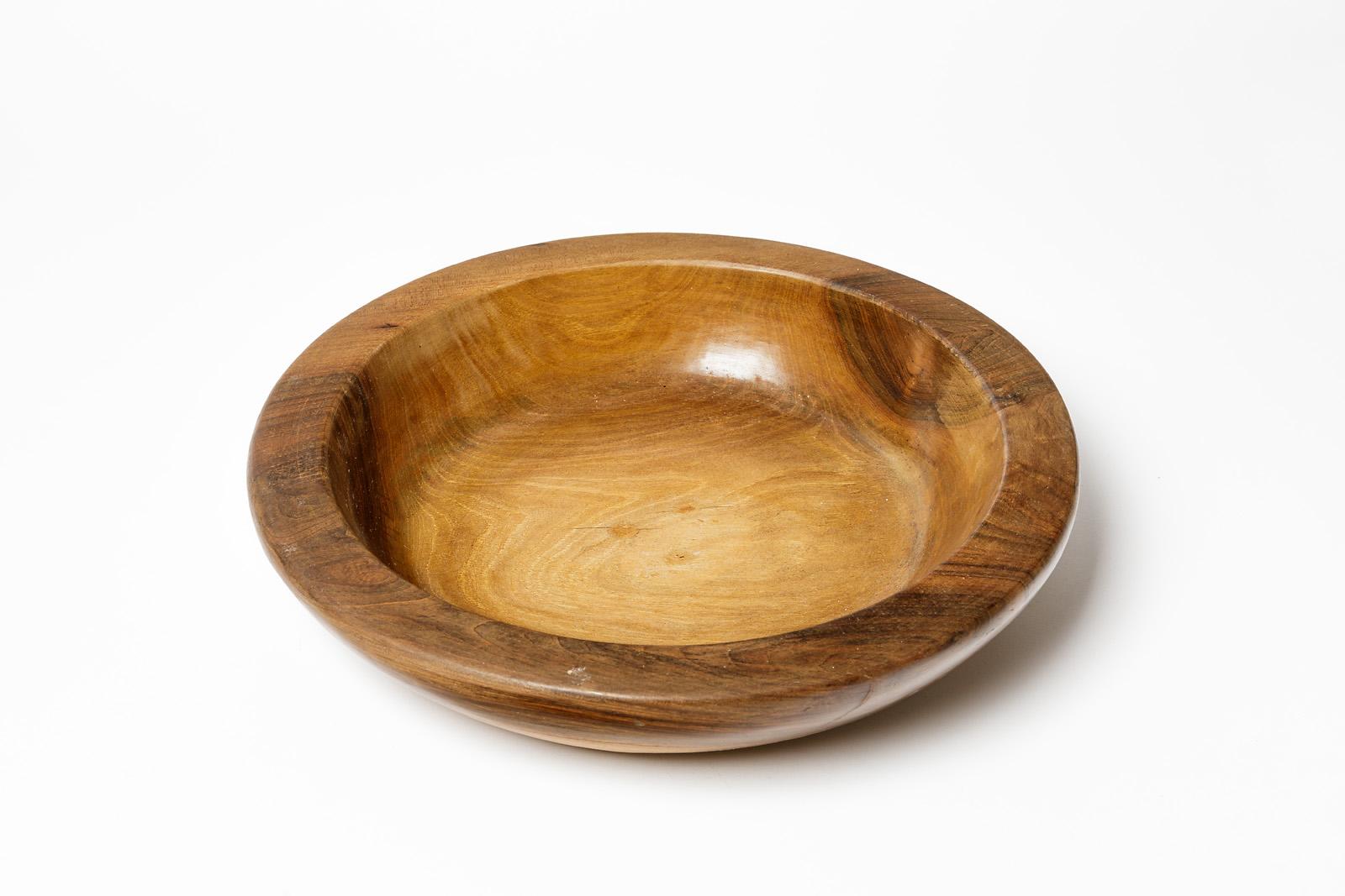 French design - 20th century - In the style of Alexandre Noll

Realised circa 1950

Olive wood sculptural plate or dish / vide poche

Original perfect condition

Measures: Height : 8 cm large : 35 cm.