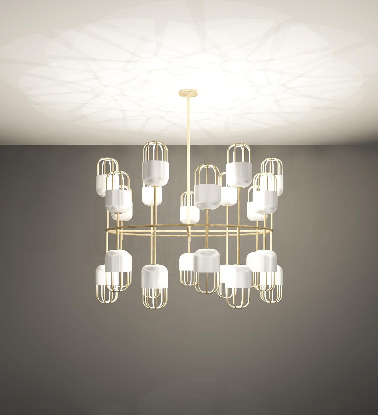 This chandelier has a bold design that uses symmetry between the outer casing and the frame of a capsule shape. The soft glow of opal glass is elegantly supported and highlighted by a beautiful brushed brass structure.
Metalwork can be powder-coated