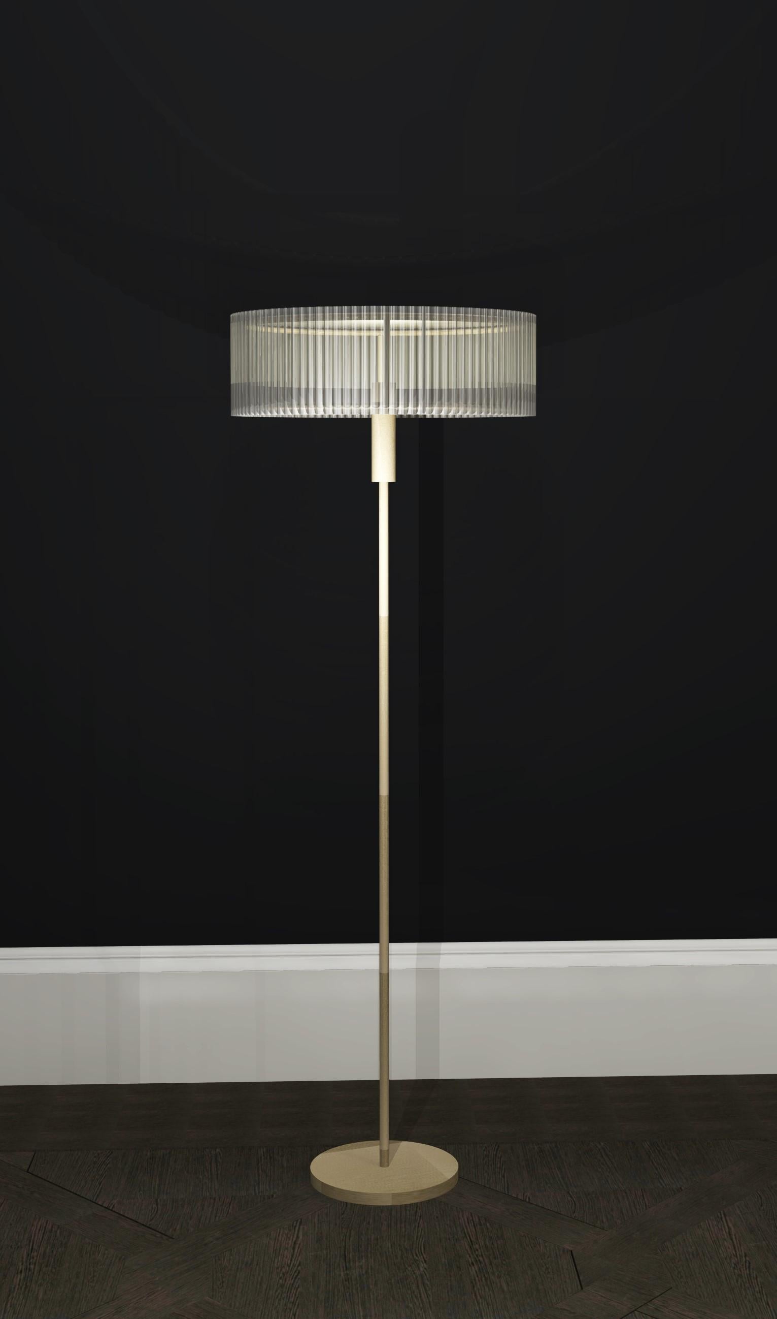 Contemporary floor lamp in fluted glass and brushed brass finish.

Diameter: 500mm 
Height: 1415mm
Base Dia: 250mm

Made to order to buyer's specification. Variations to dimensions and finishes can be made.