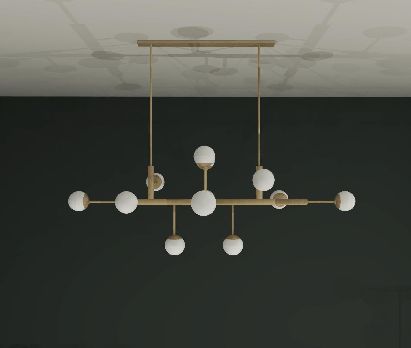 Design and crafted by world-renowned lighting brand IMAGIN, and inspired by architectural details and mid-century design, this chandelier is simple and bold. Using geometric language and limited materials, consistent, yet sophisticated compositional