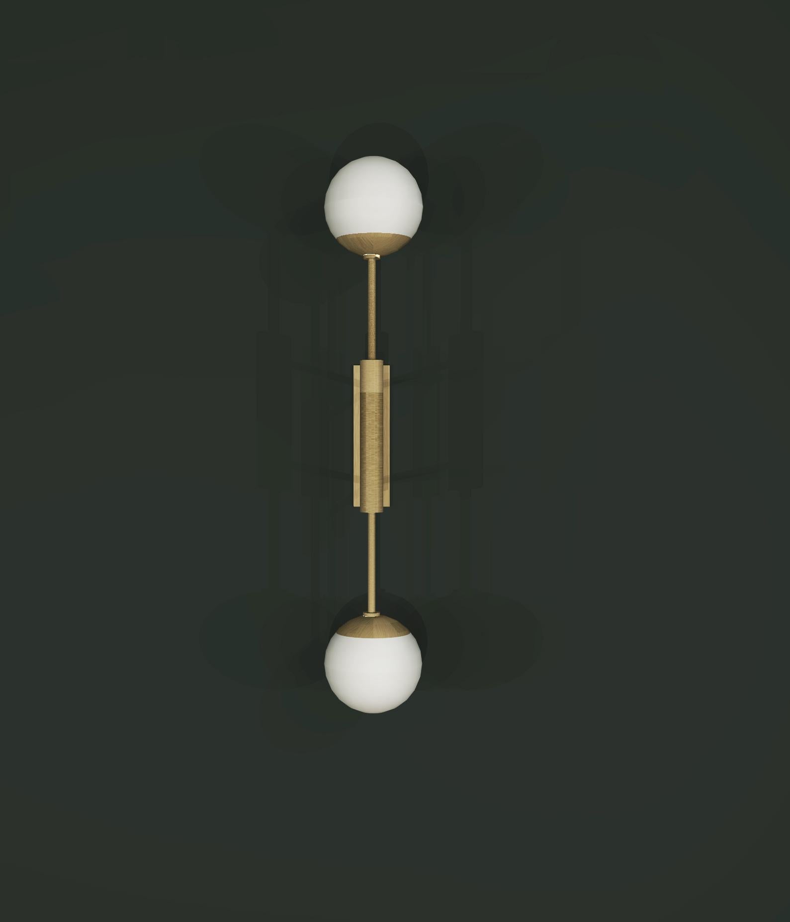 Design and crafted by world-renowned lighting brand Imagin, and inspired by architectural details and midcentury design, this wall light is simple and bold. Using geometric language and limited materials, consistent, yet sophisticated compositional