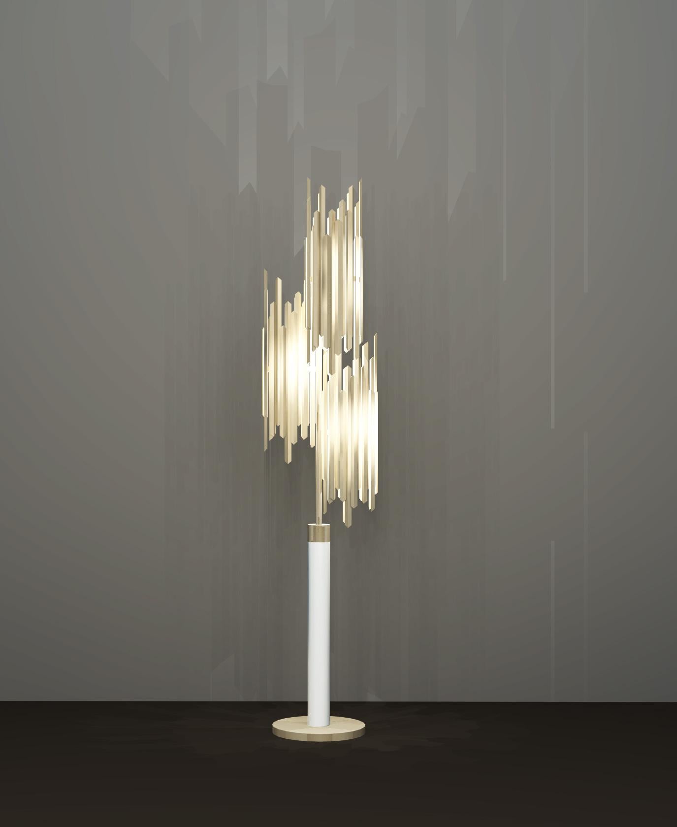 This floor lamp is part of a visionary collection that uses the exceptional qualities of brass and the fascinating formation of ice shards to create a chic and unusual collection of lighting perfect for giving an exclusive feel to any