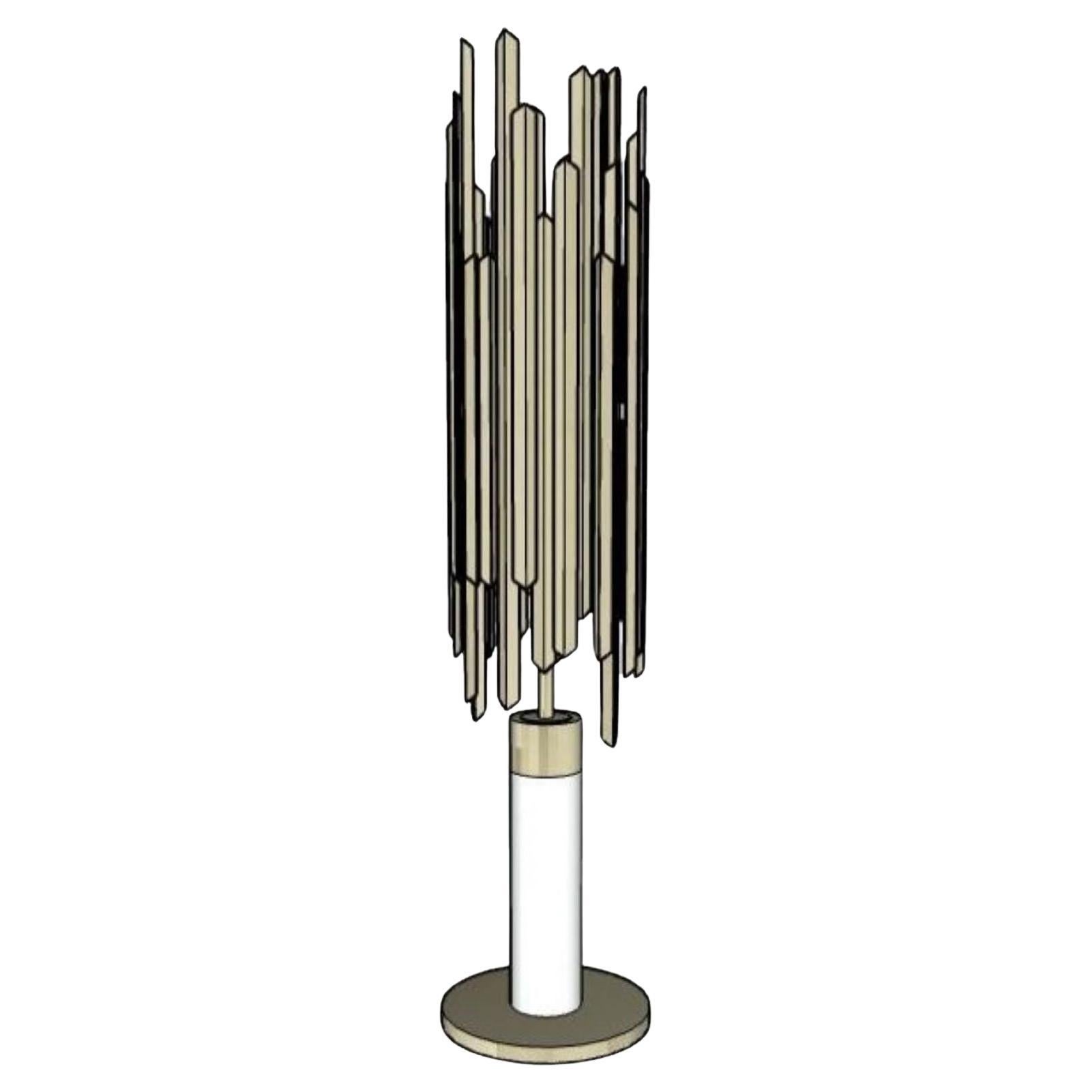 This table lamp is part of a visionary collection that uses the exceptional qualities of brass and the fascinating formation of ice shards to create a chic and unusual collection of lighting perfect for giving an exclusive feel to any