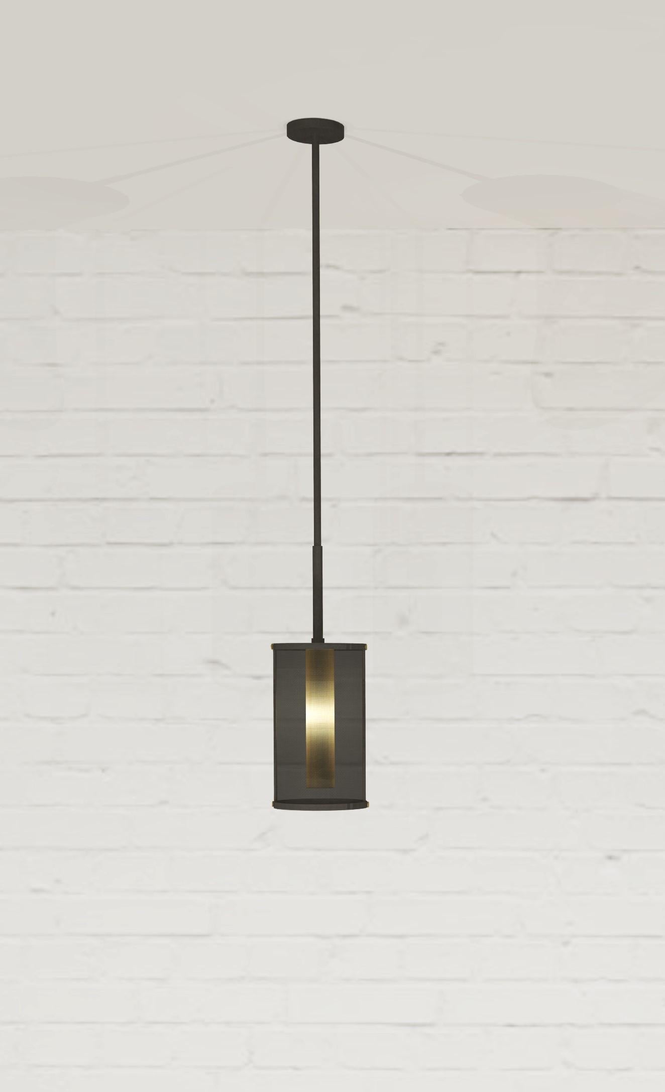 This pendant is made from two types of metal: antique bronze and antique brass. The light source is concealed with an antique brass mesh, while outer shade with antique bronze mesh. The main idea for this design was continuously layering of