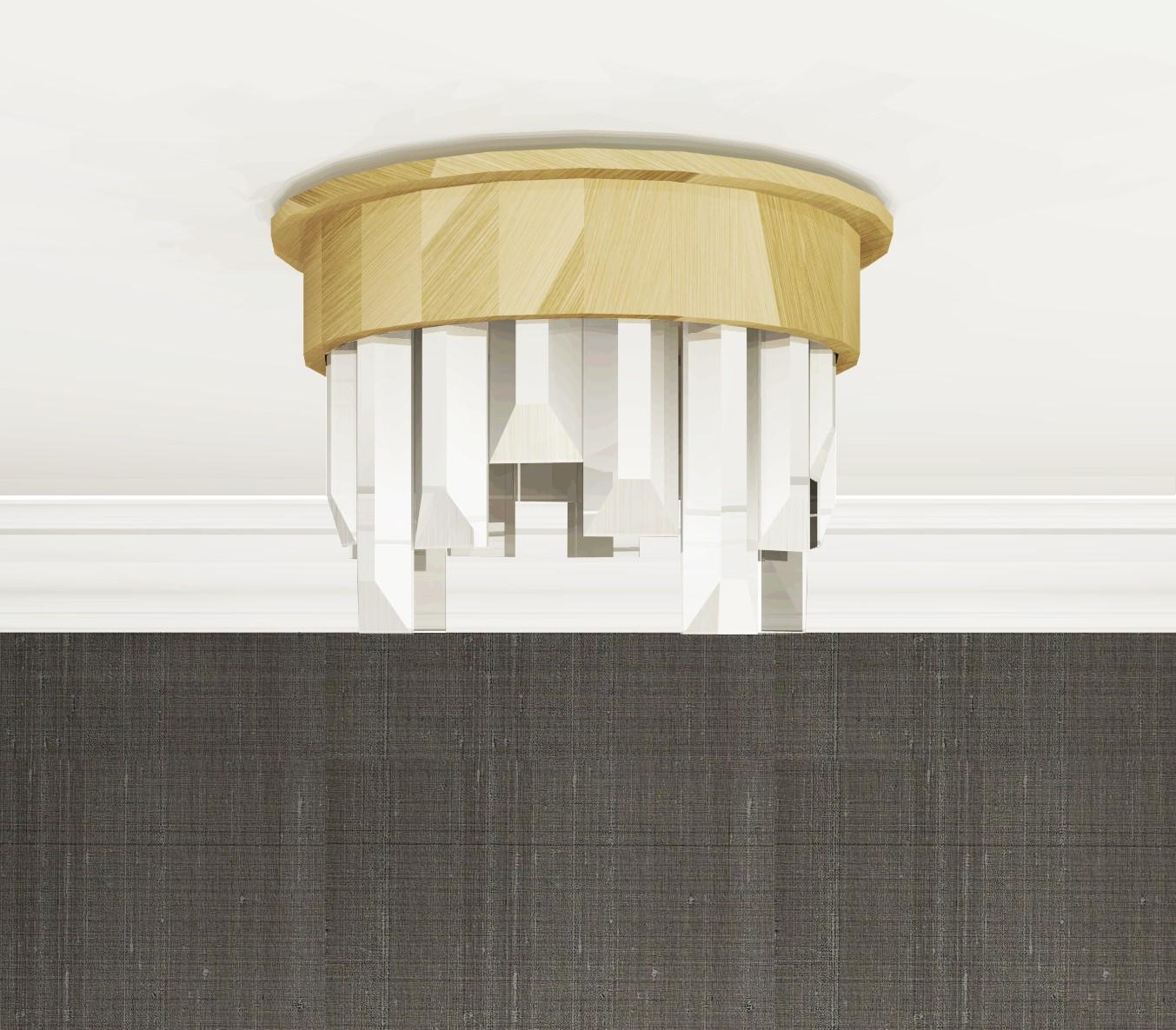 This flush mount uses a mix of bold materials, brushed brass band and over-sized crystal elements, to give impact whilst remaining clean and classic. The designs cool, clean, beveled-edge crystals give a beautiful reflection and transparency, whilst