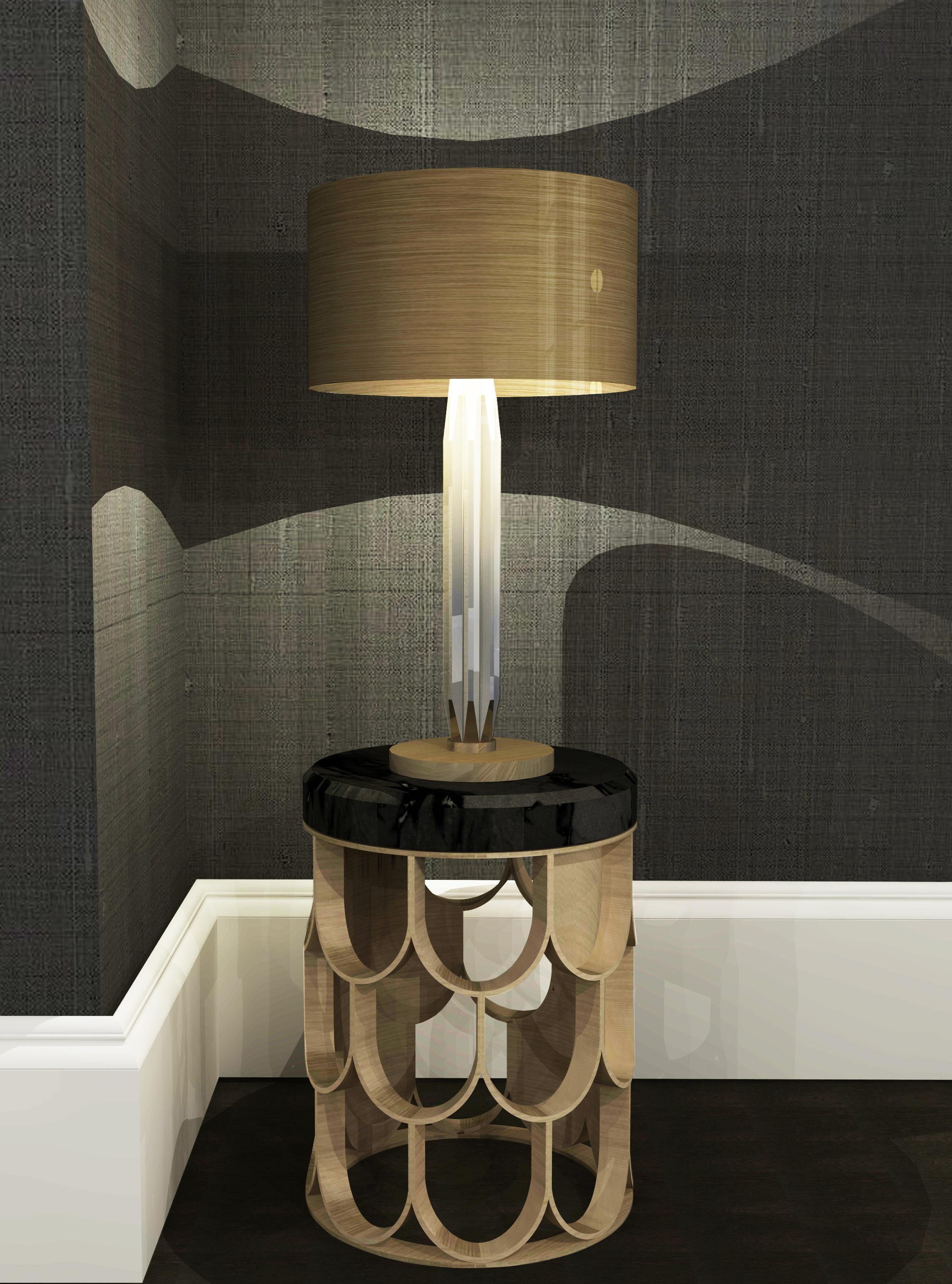This table lamp uses a mix of bold materials, brushed brass band and over-sized crystal elements, to give impact whilst remaining clean and classic. The designs cool, clean, beveled-edge crystals give a beautiful reflection and transparency, whilst