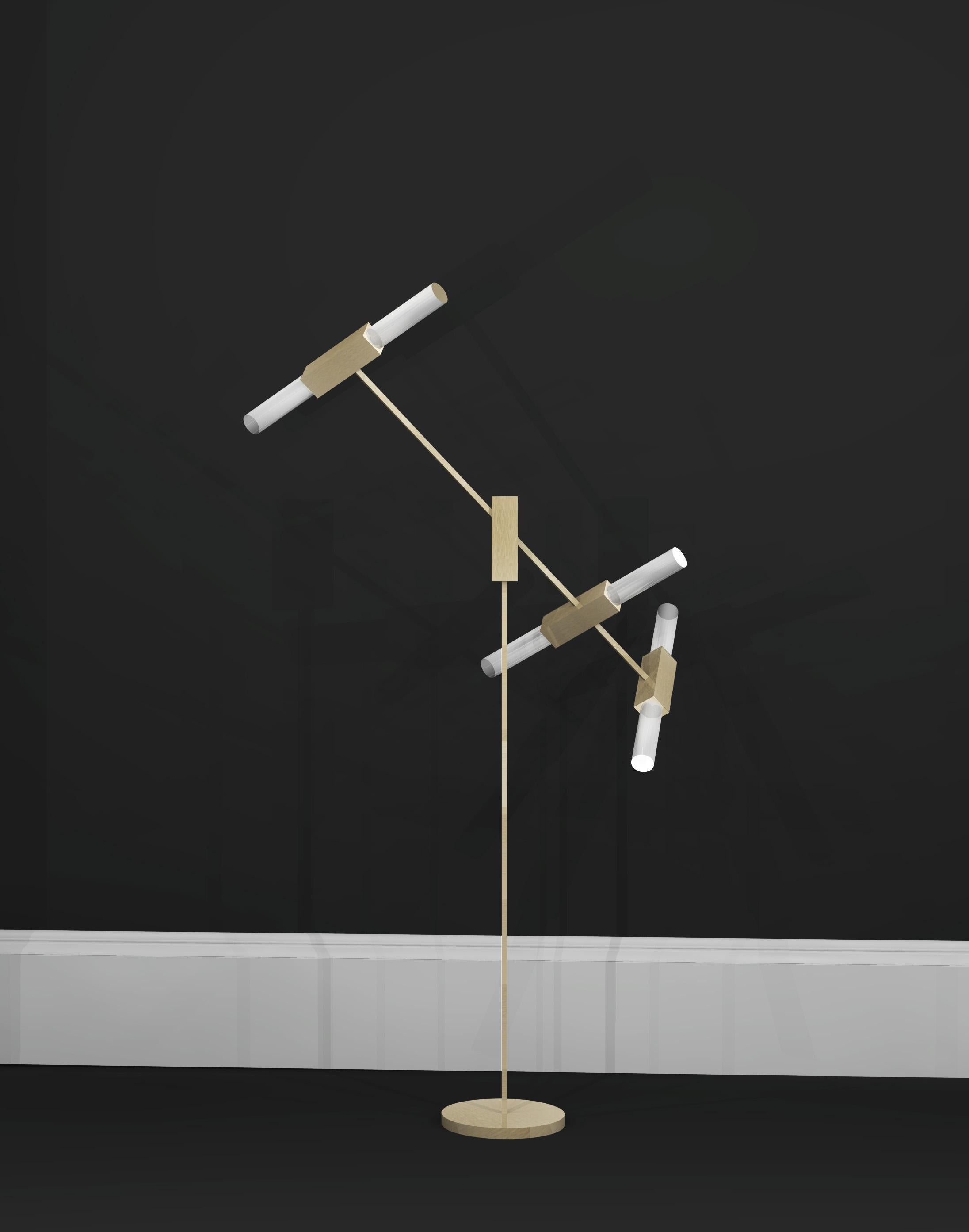 This floor lamp is part of a range that was originally designed as bathroom lights and developed into a full collection, created to achieve a timeless design. Using high quality materials including fine brass and glass, a striking, sleek design