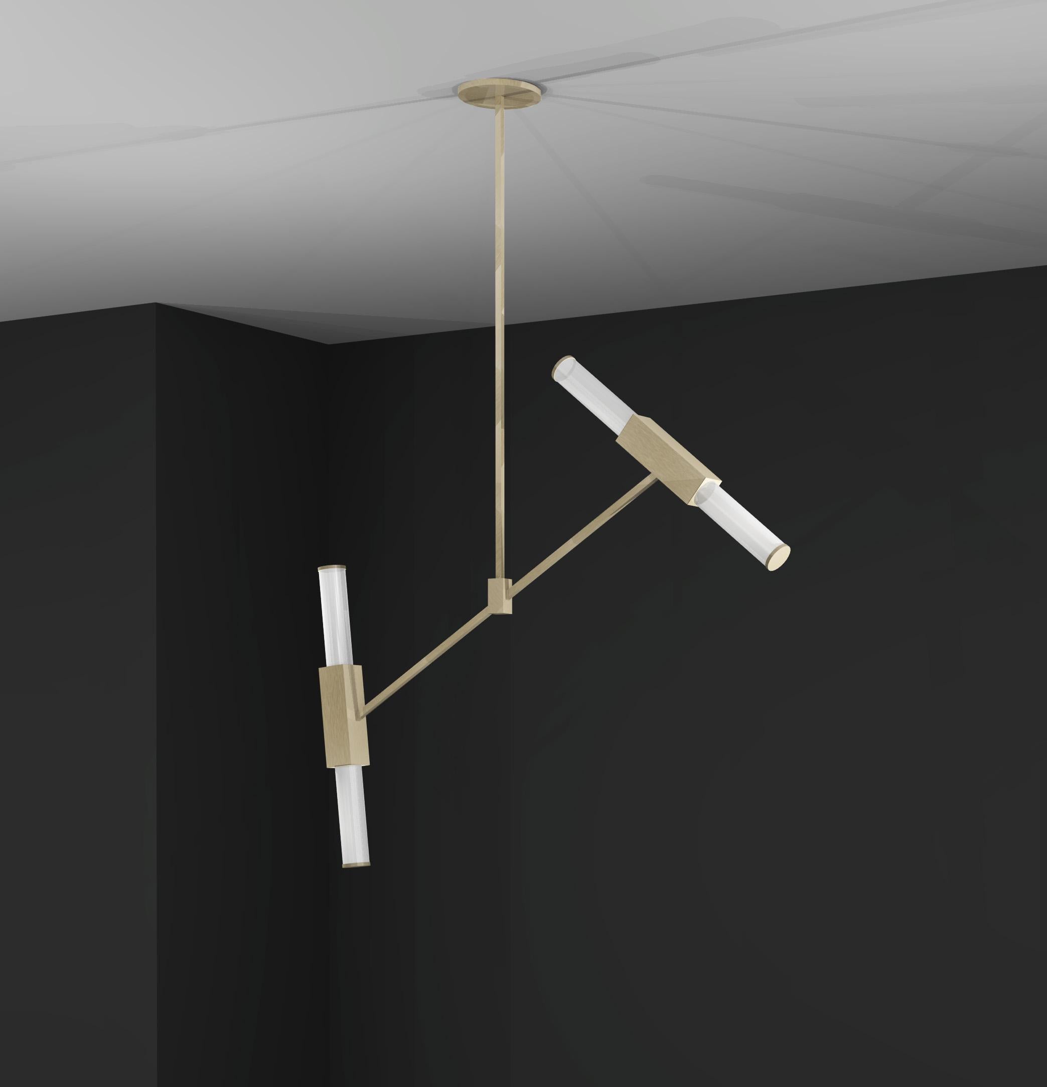 This pendant is part of a range that was originally designed as bathroom lights and developed into a full collection, created to achieve a timeless design. Using high quality materials including fine brass and glass, a striking, sleek design creates