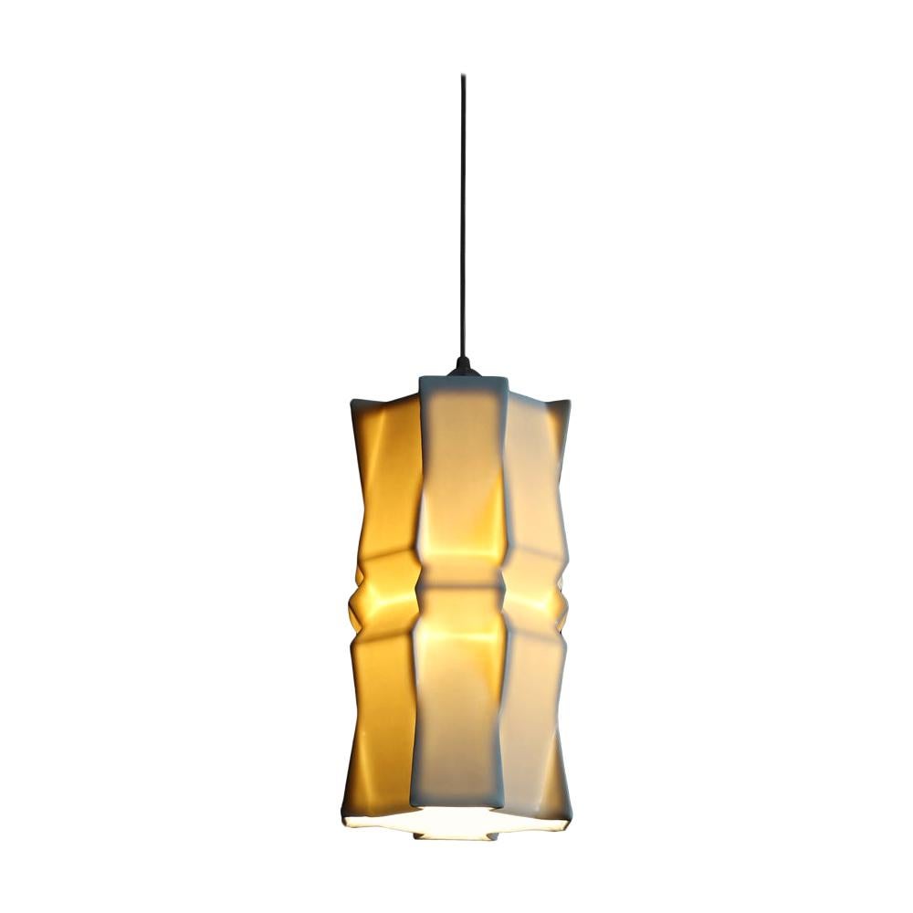 9 inch hanging pendant light the most intricate of the Tessellation collection, this hanging pendant emits a soft, elegant glow through a striking geometric porcelain shade, shining direct downward light through the open base. With its modular