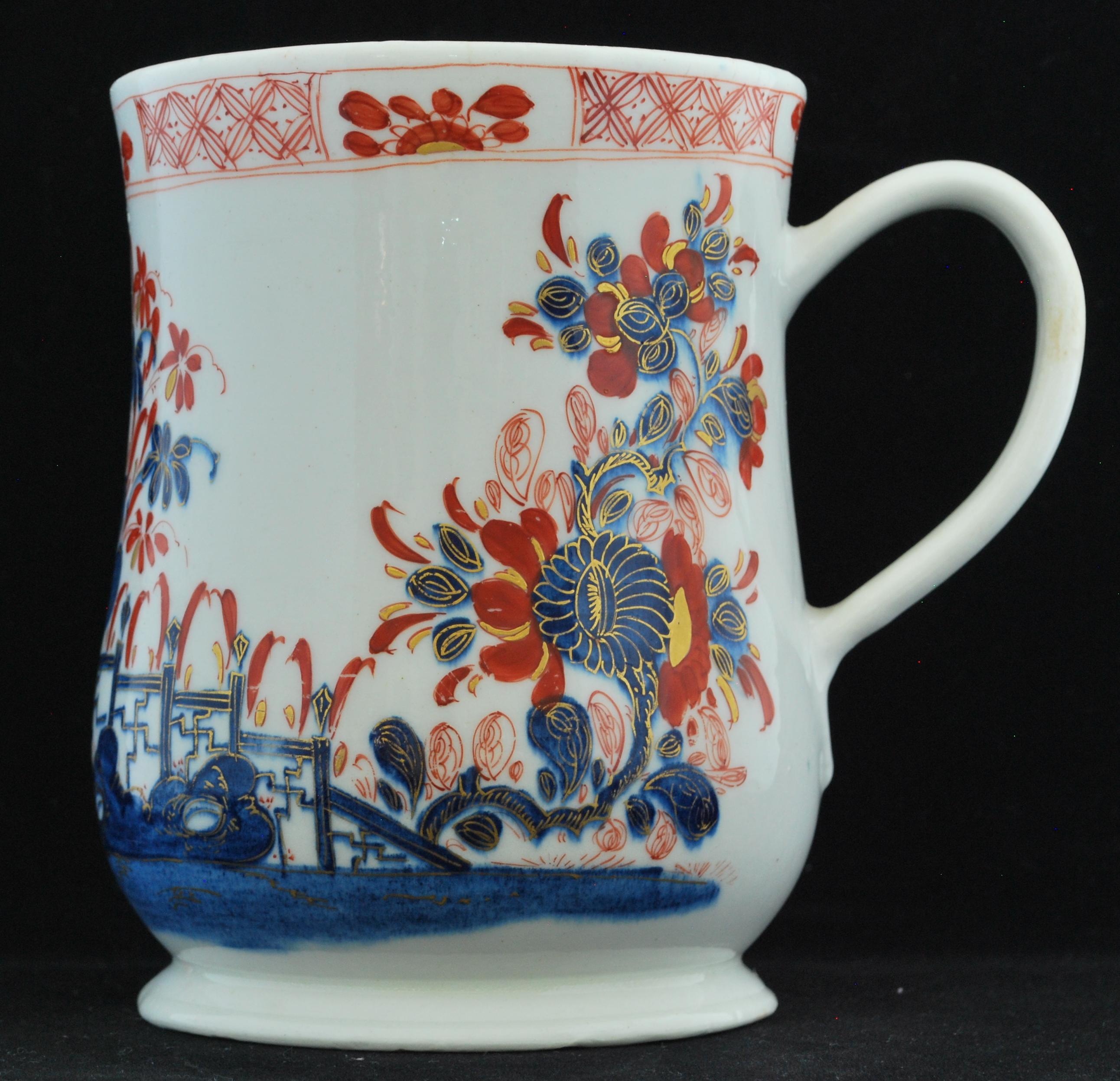 One and-a-half pint mug of baluster form with flared base and large strap-handle with heart-shaped terminal. Painted after the Imari with an oriental garden.

Prov: Taylor Collection; P&R Daniels

Catalogue Entry: Mug, circa 1752-1754: One
