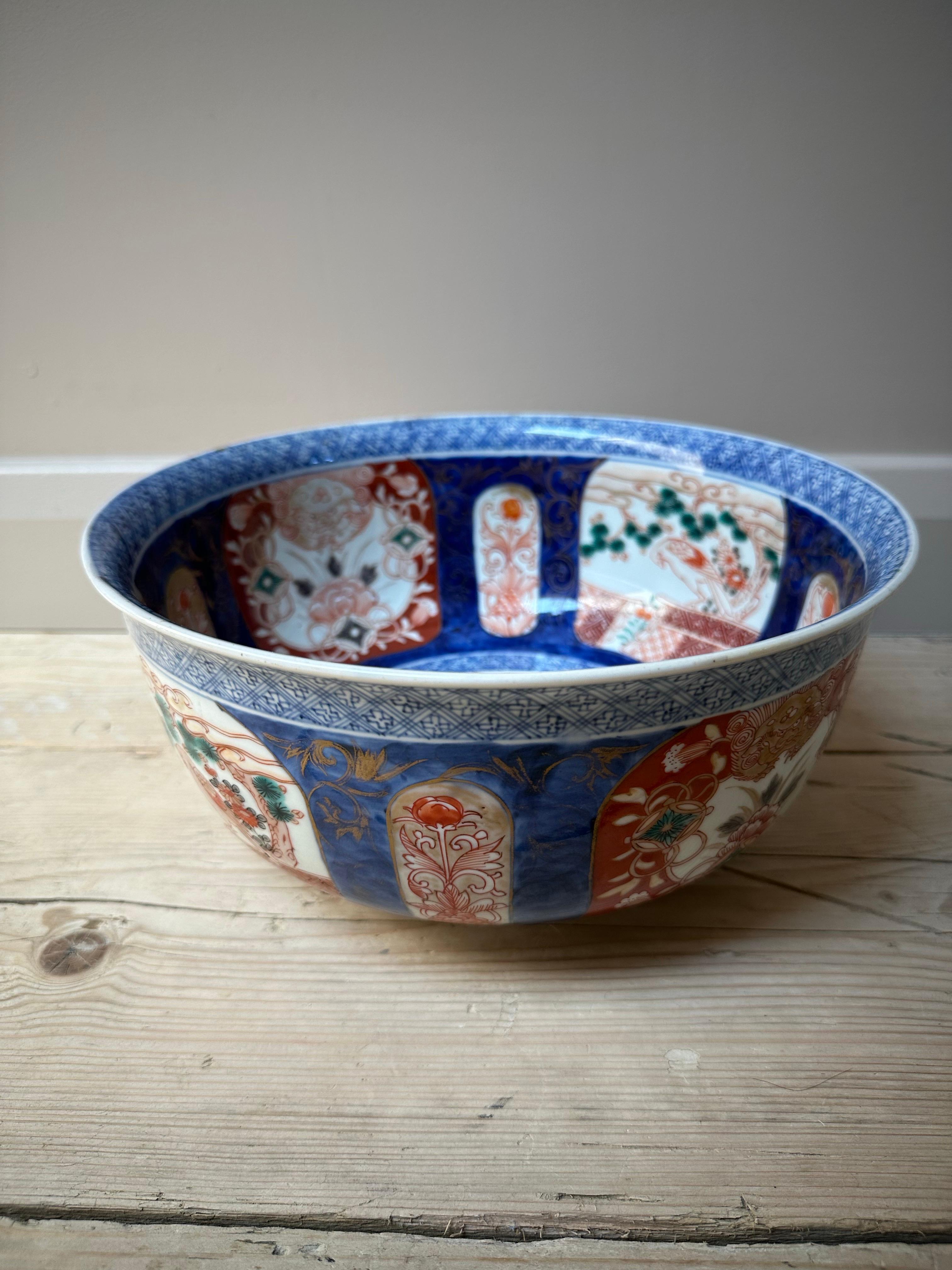 The image shows an Imari porcelain bowl, a distinctive style of Japanese export porcelain.
Origin and Name:
Imari ware originated in the Arita kilns of the former Hizen Province in northwestern Kyūshū, Japan. It is named after the port of Imari,