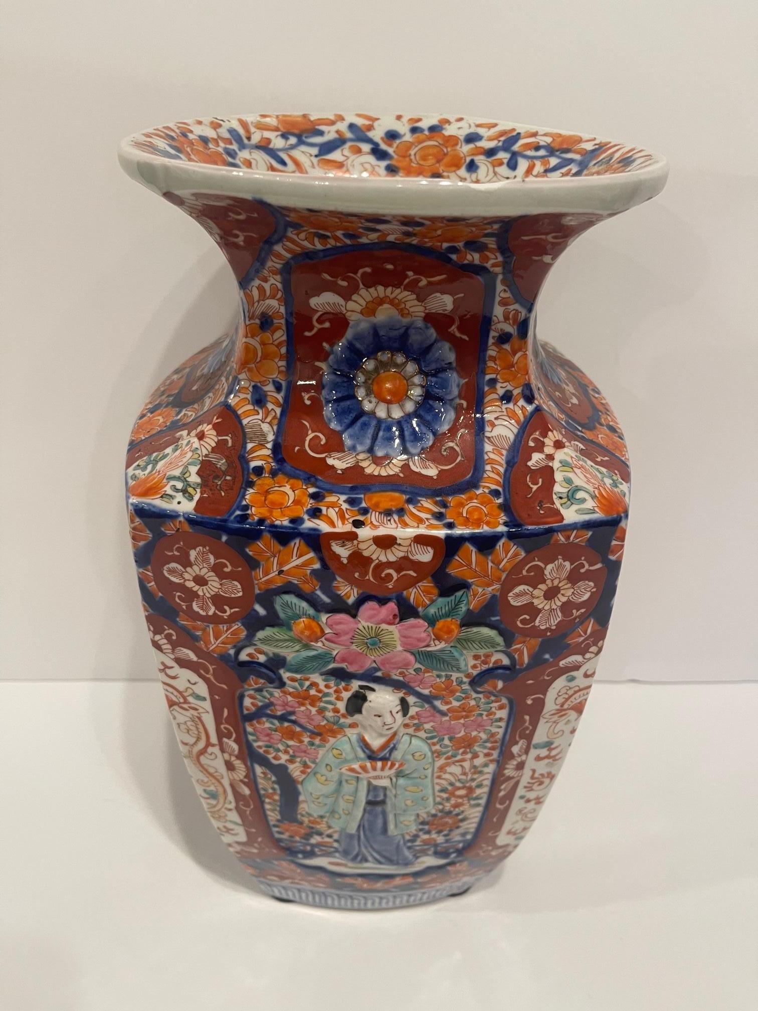 Japanese Imari Porcelain Vase with Raised Figures, 19th Century For Sale