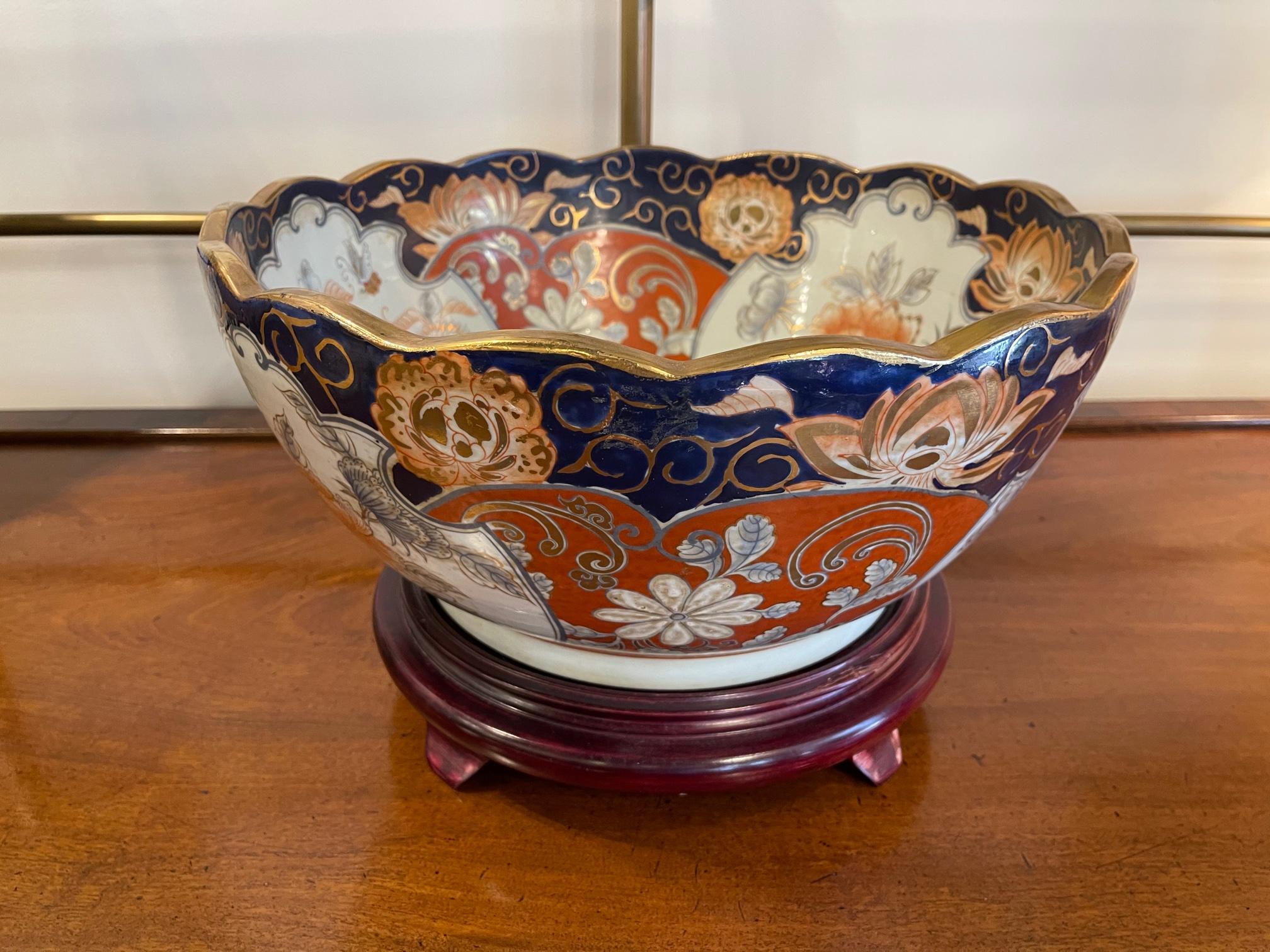 Imari style center or punch bowl on wood stand, 20th century. Originally purchased from Gumps Not for food use. 10.25