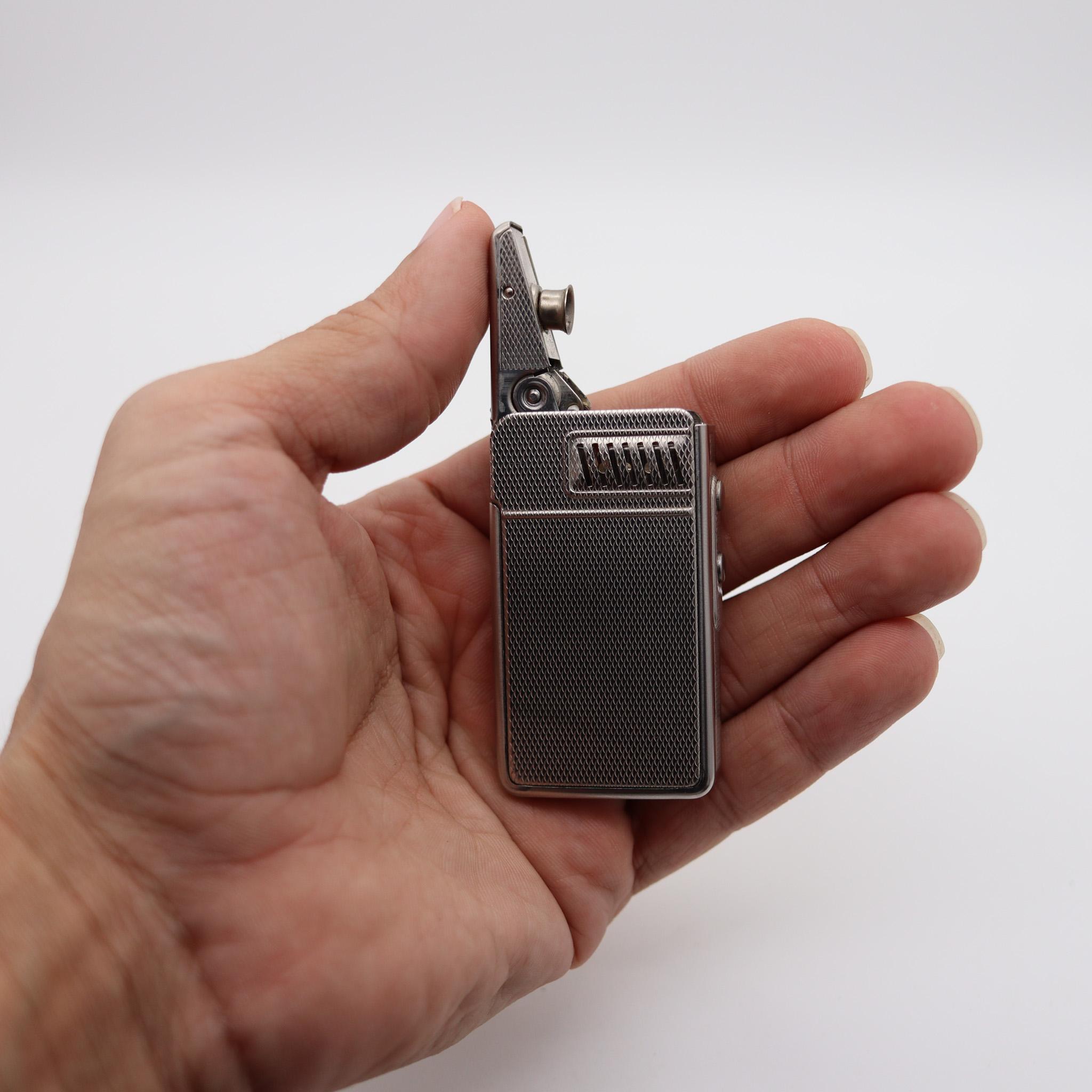 Primex 6300 lighter designed by IMCO.

This is a brilliantly engineered, unusual and quite ingenious semi-automatic pocket lighter designed by Julius Franz Meister in Austria, back in the 1953. This model was made by the IMCO company and was named