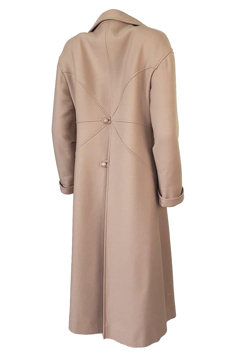 This coat is stunning in its simplicity and sense of timelessness. It is made out of a light wool that has almost a jersey finish to it. The color in person is more of a true camel than how my camera could capture it and I think the color is far