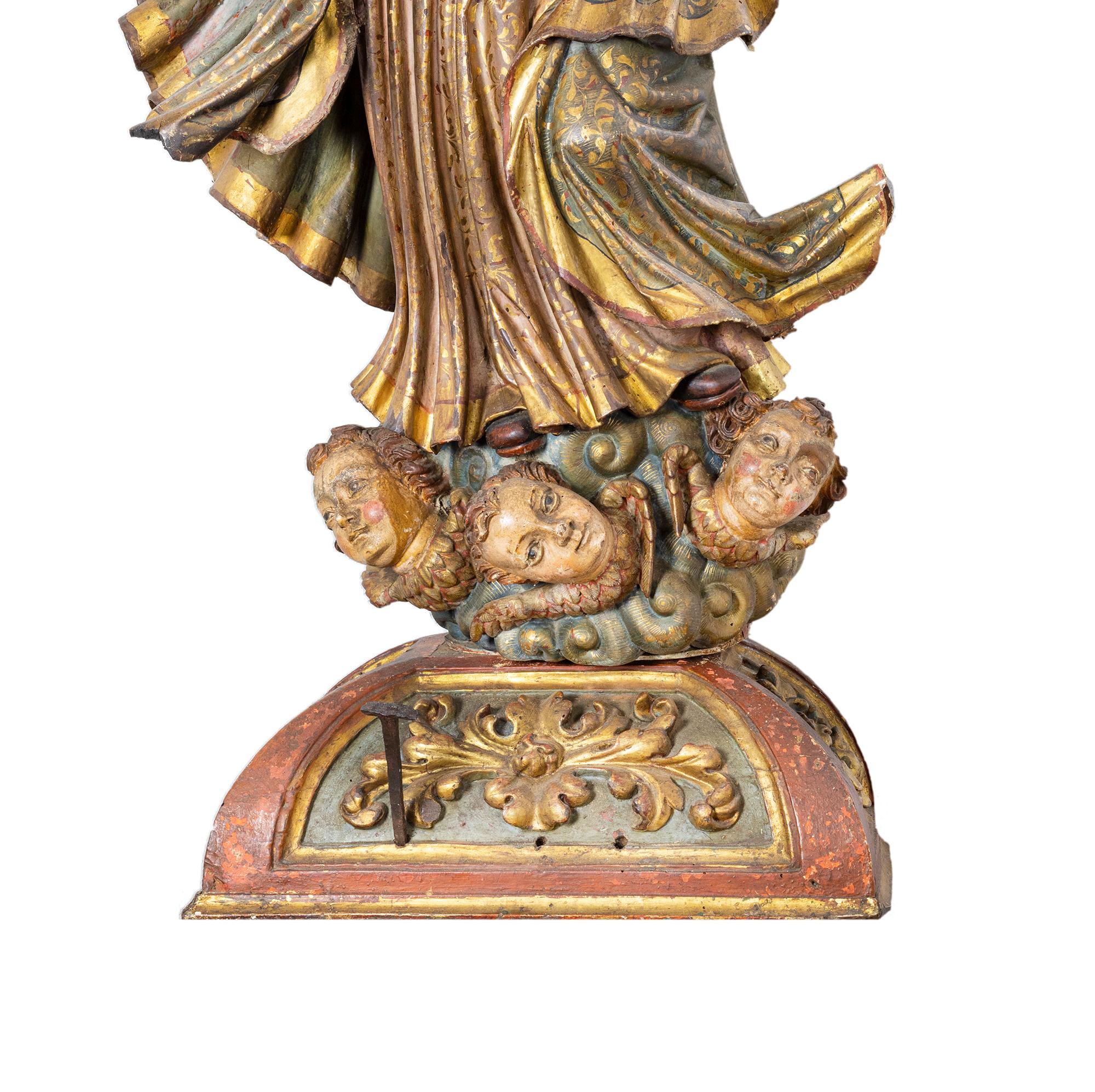 An exceptional 18th-century Spanish Baroque sculpture of the Immaculate Conception, carved in chestnut wood and richly polychromed and crowned. 

The sculpture retains its vibrant pigments, which highlight the flowing robes and serene facial