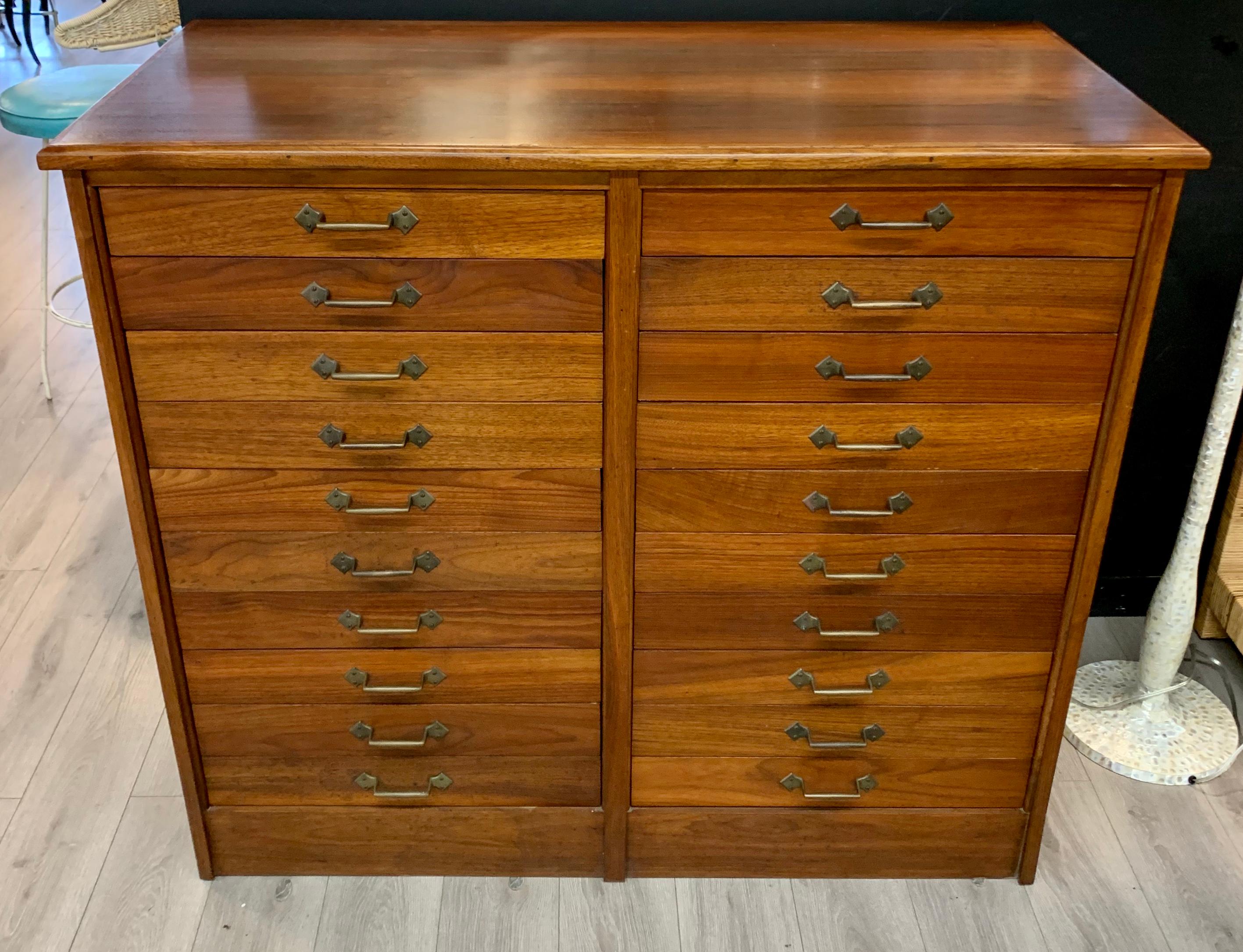 Magnificent twenty-drawer cherrywood architects flat file cabinet that features ten drawers on each side.