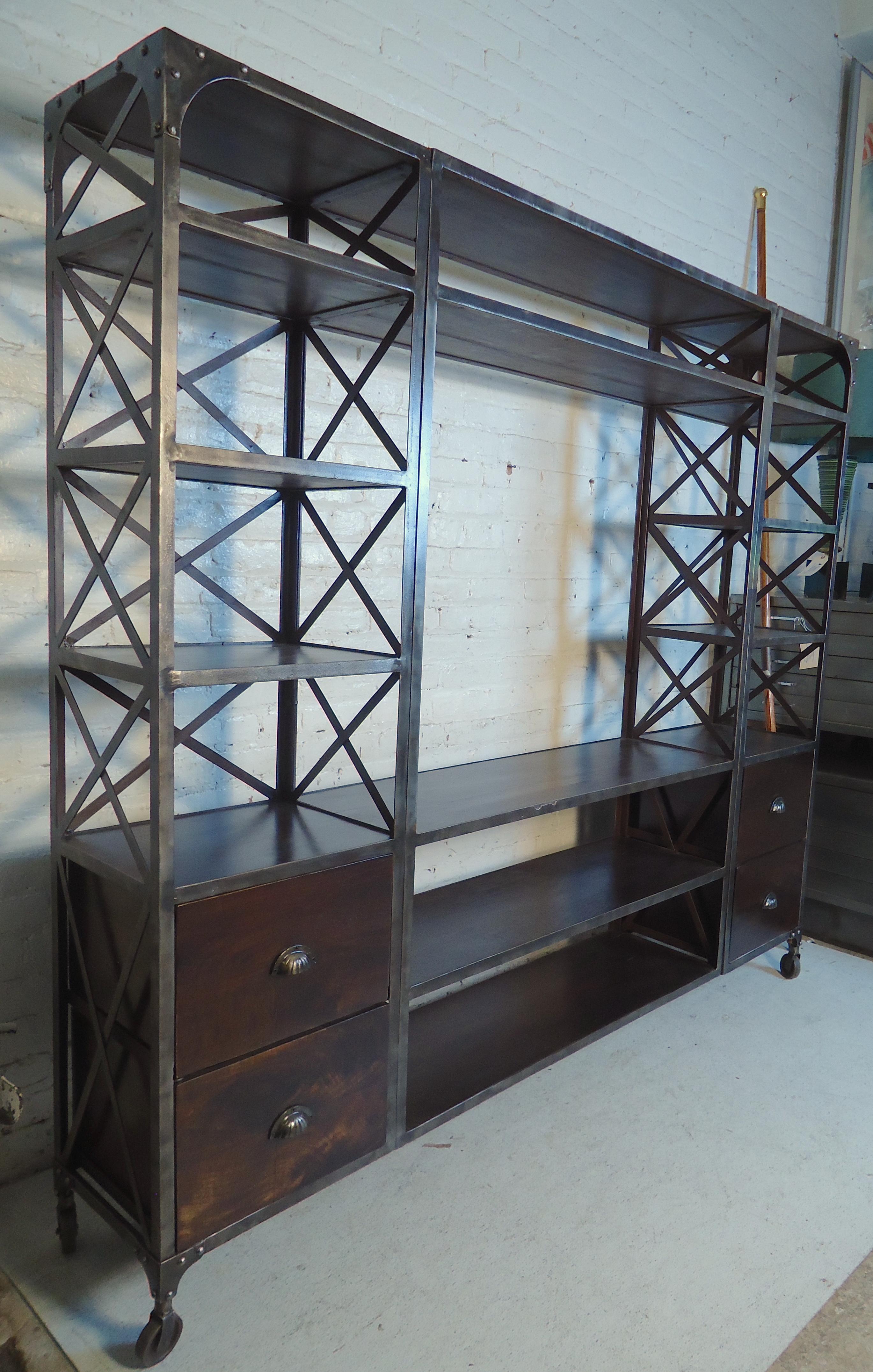 Tall wall unit with iron and reclaimed wood, featuring ample shelf and drawer storage.
(Please confirm item location - NY or NJ - with dealer).
  