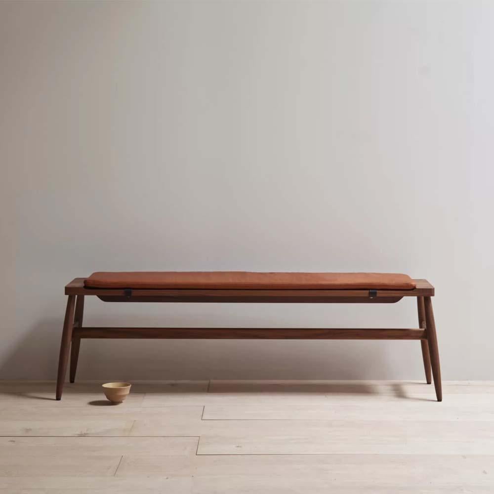 English Imo bench in walnut and leather tan pad For Sale