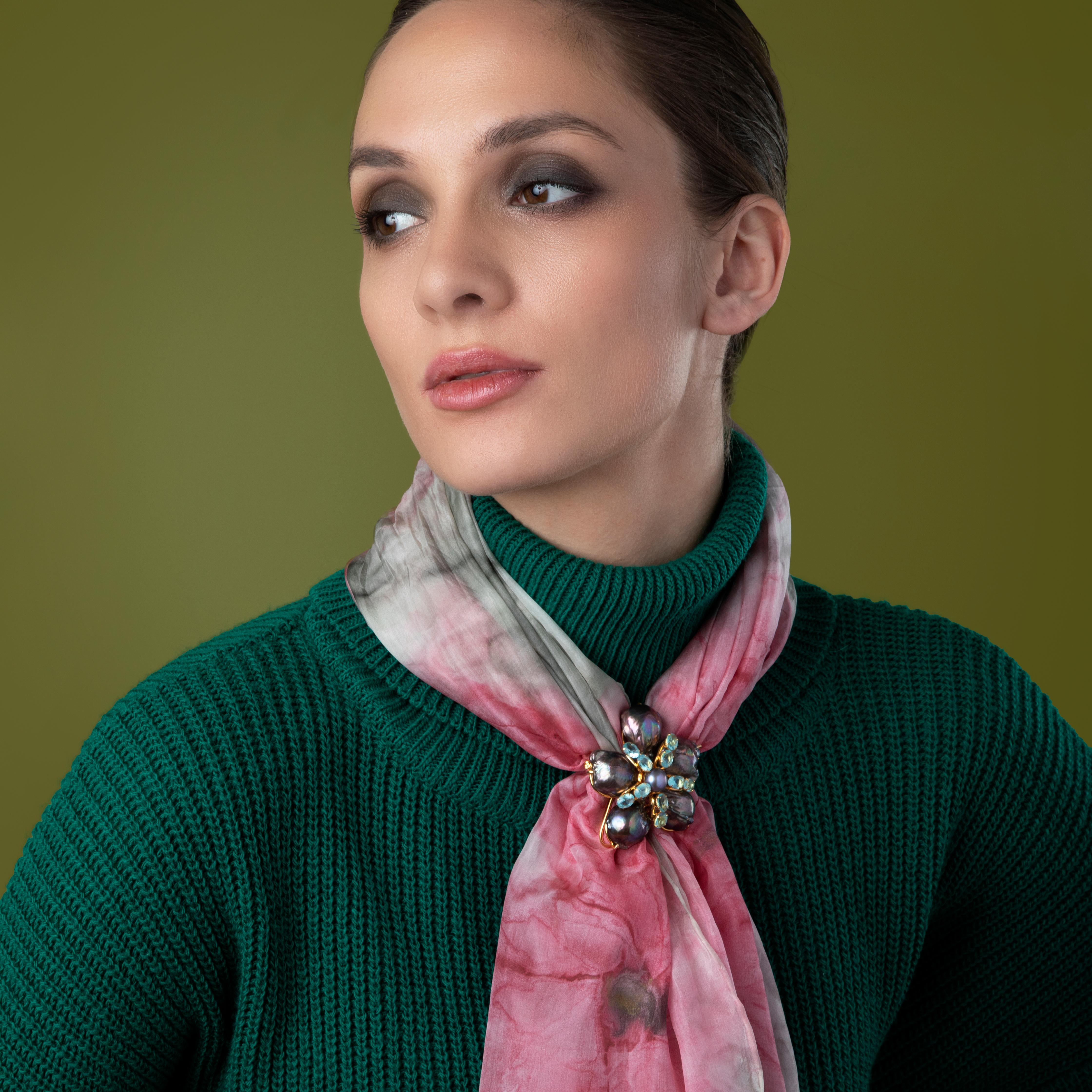 Lulu Pendant/Brooch crafted from semi-precious stones features a stunning flower design in unique colors, perfect for complementing any outfit throughout the seasons. Its retro and vintage-inspired design allows for versatile styling — wear it as a