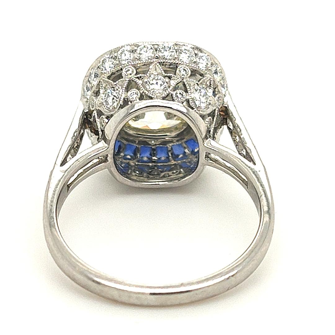 Art Deco Impeccable 3.07 Carat Cushion Diamond Platinum Sapphire Ring