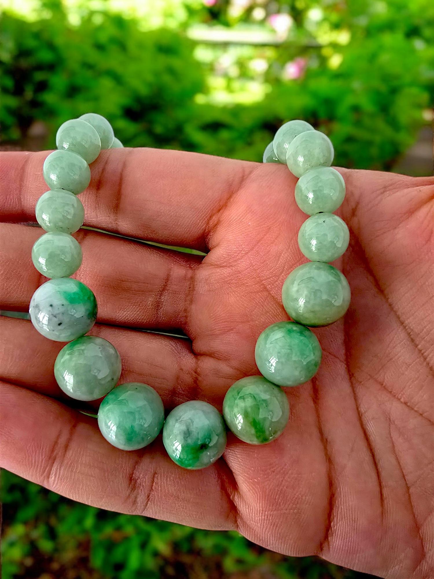 13.50 mm x 7 Beads each, 10mm x 42 Beads each; perfectly calibrated Green Burmese Jadeite Beads Necklace with Sterling Silver 925. This unique beads Necklace is 100% cut, calibrated, strung, and Made in Hong Kong. Some of the rarest naturally