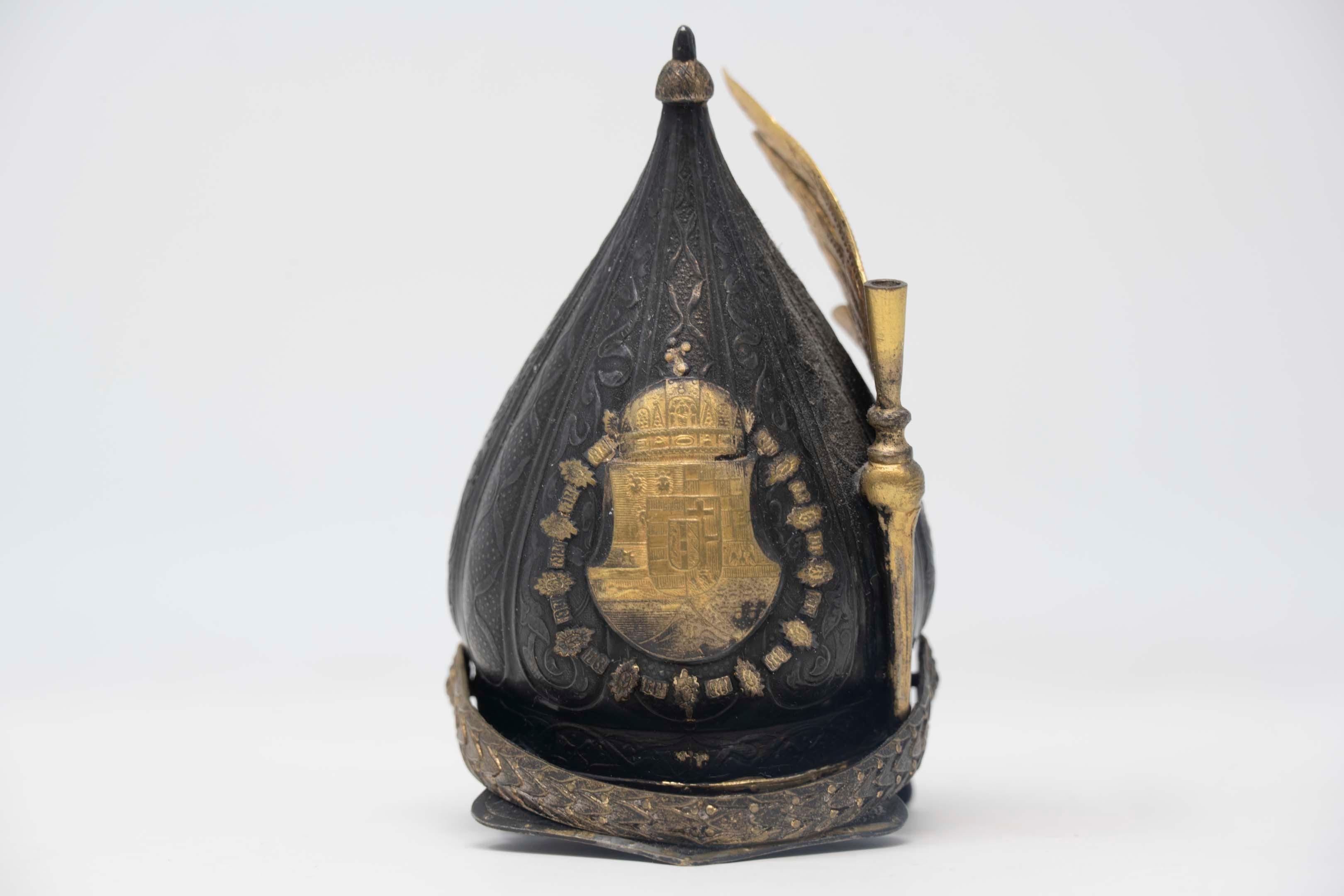 Imperial Austrian court miniature helmet and royal Hungarian crown guard. Maker unknown, silver-plated, parcel gilt. Measures 8cm tall, circa 1900. In good condition.
