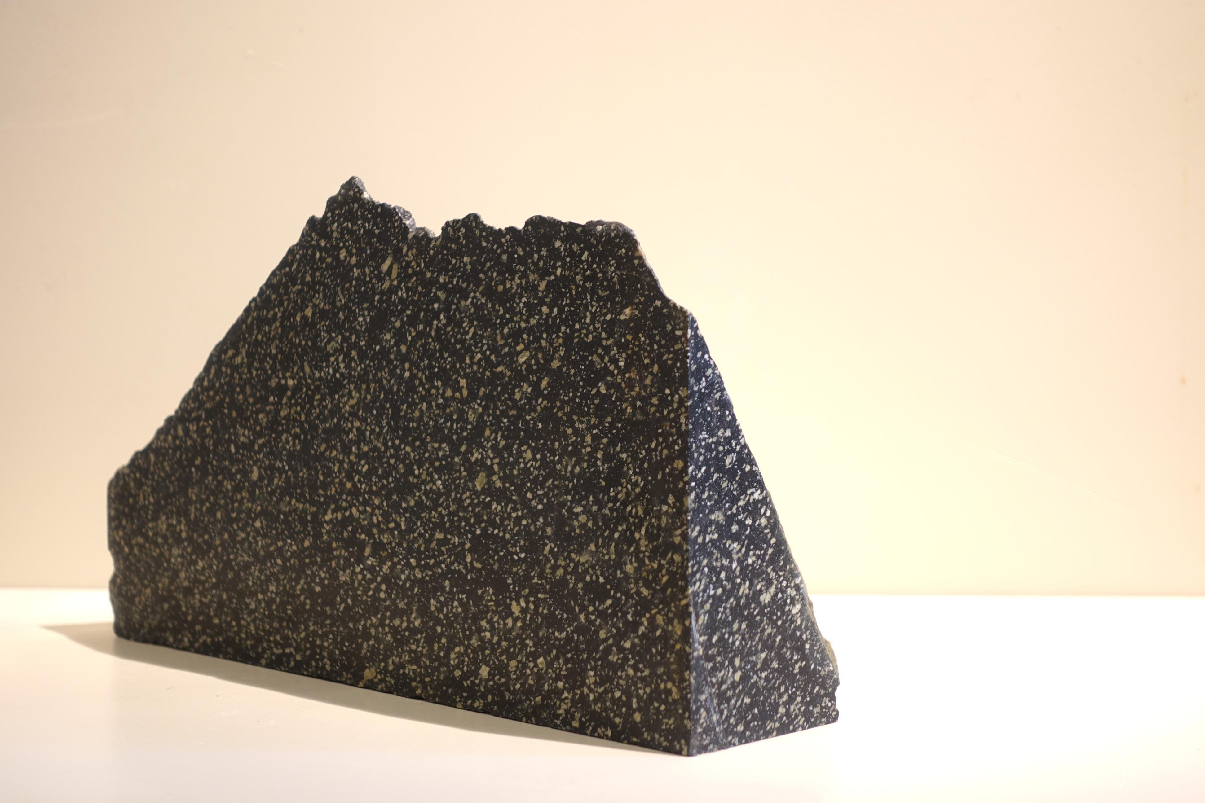 Imperial Black porphyry
Roman fragment, partially polished
Gebel Dokhan (Mons Porphyrites) - Egypt 
16 x 29 x 13 cm

Porfido Nero is an exceeding rare Black Variety of Imperial Porphyry from Gebel Dokhan (the Ancient Mons Porphyrites) in the Eastern