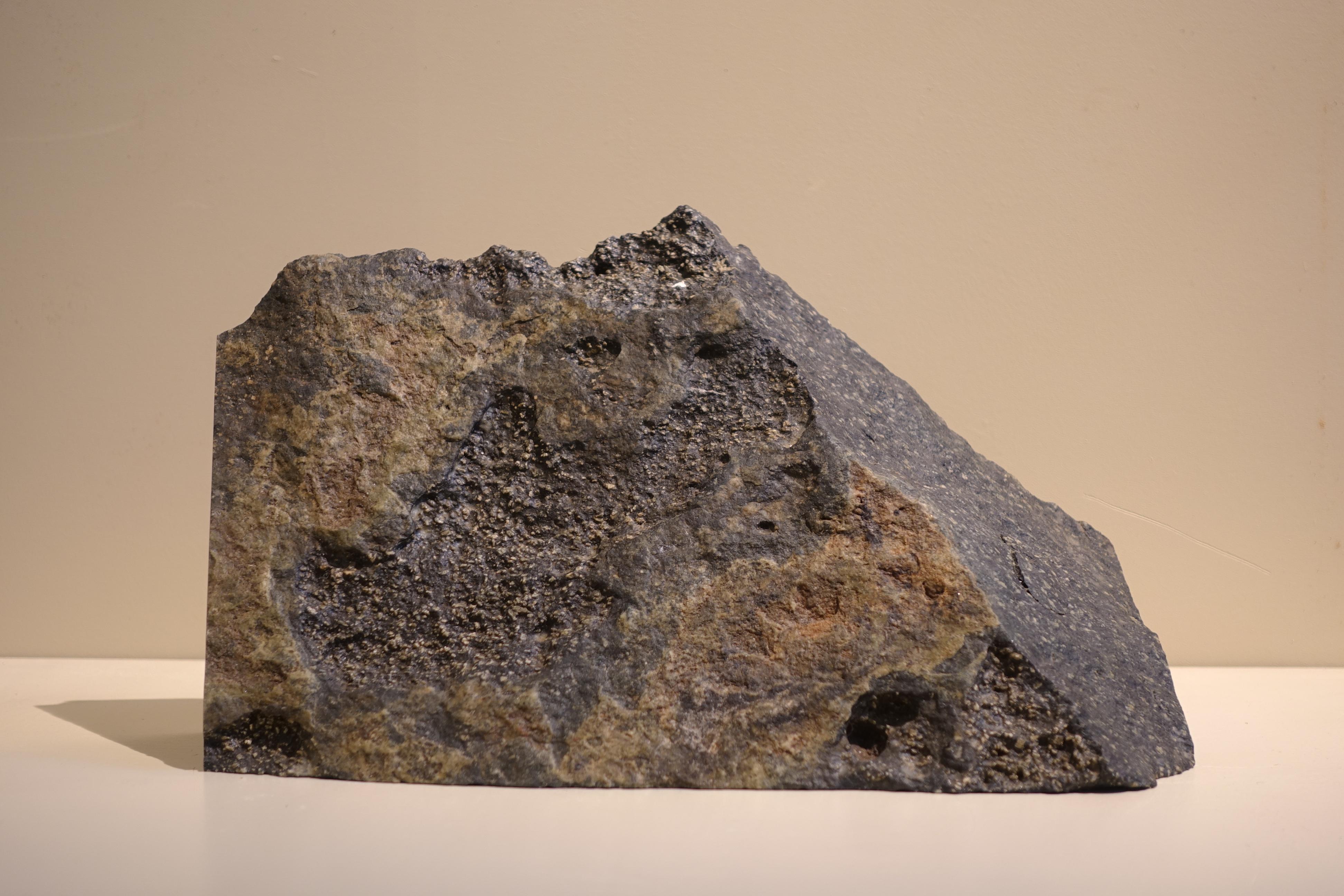 Carved Imperial Black porphyry specimen