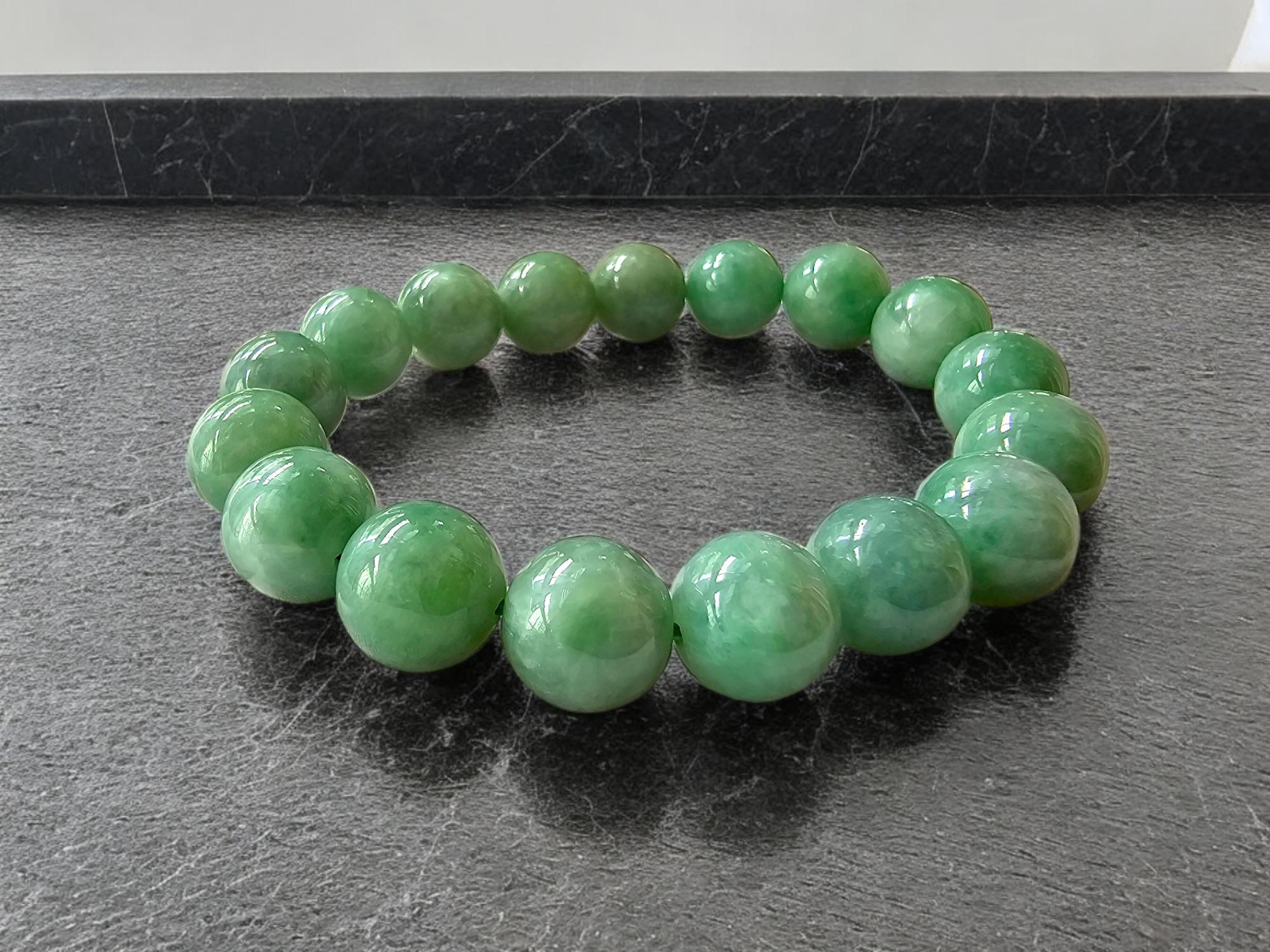 Imperial Japanese Green Burmese A-Jade Jadeite Beaded Bracelet (MADE IN JAPAN) (12mm Each x 17 beads) 05016 with calibrated ball beads.

12mm each, 17 perfectly calibrated Green Burmese Jadeite Beads. This unique beads bracelet is 100% cut,