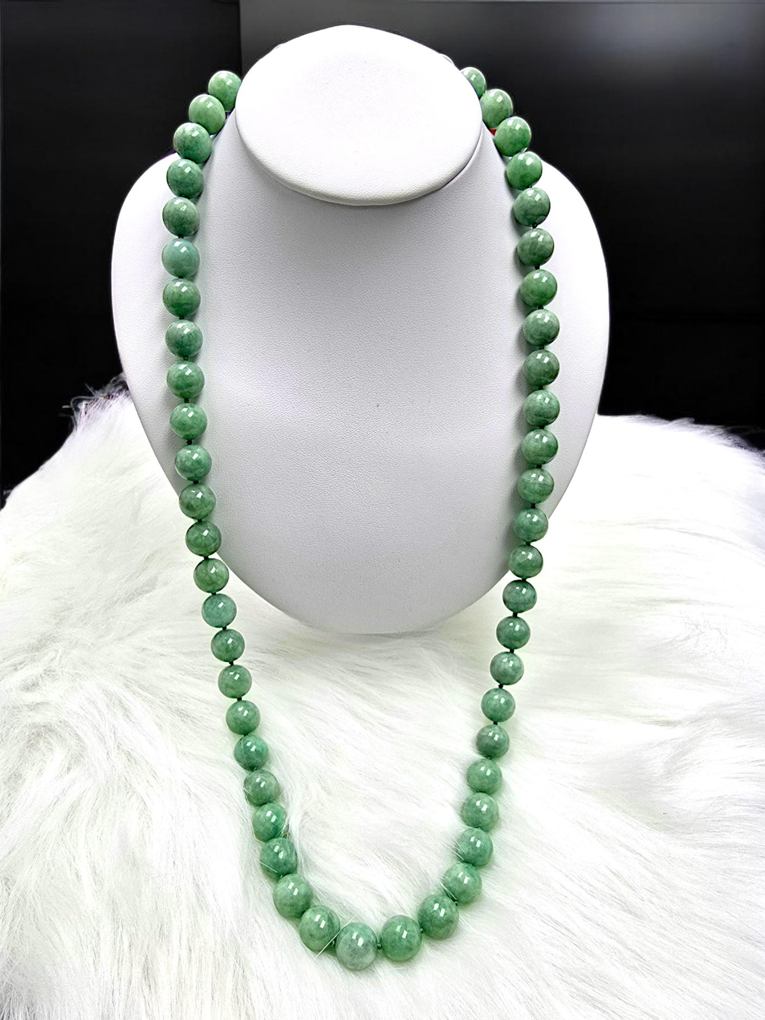 12.50mm each x 55 Beads; perfectly calibrated Green Burmese A-Jadeite Beads extra long (29.50 inches, or 75 cm) Necklace with a Black Spinel studded and Sterling Silver 925 magnetic clasp. This unique beads Necklace is 100% cut, calibrated, strung,