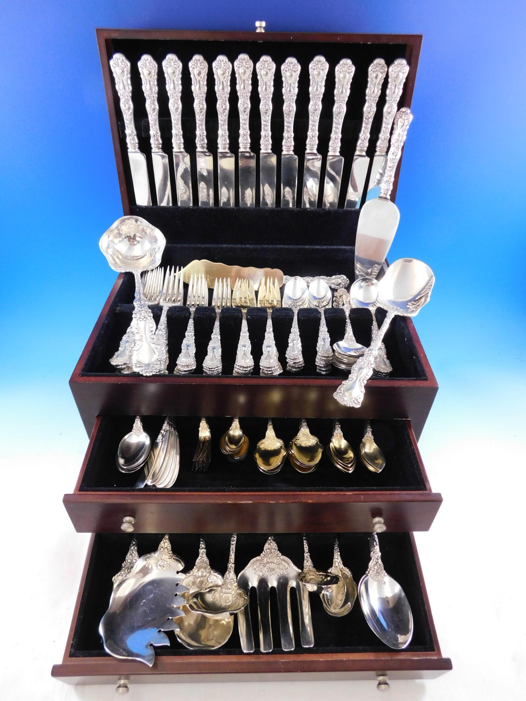 Monumental Imperial Chrysanthemum by Gorham sterling silver Flatware set, 162 pieces. Chrysanthemum flowers run down both the back and front side of the handle with chrysanthemum blooms spilling down onto the reverse. This glorious pattern was
