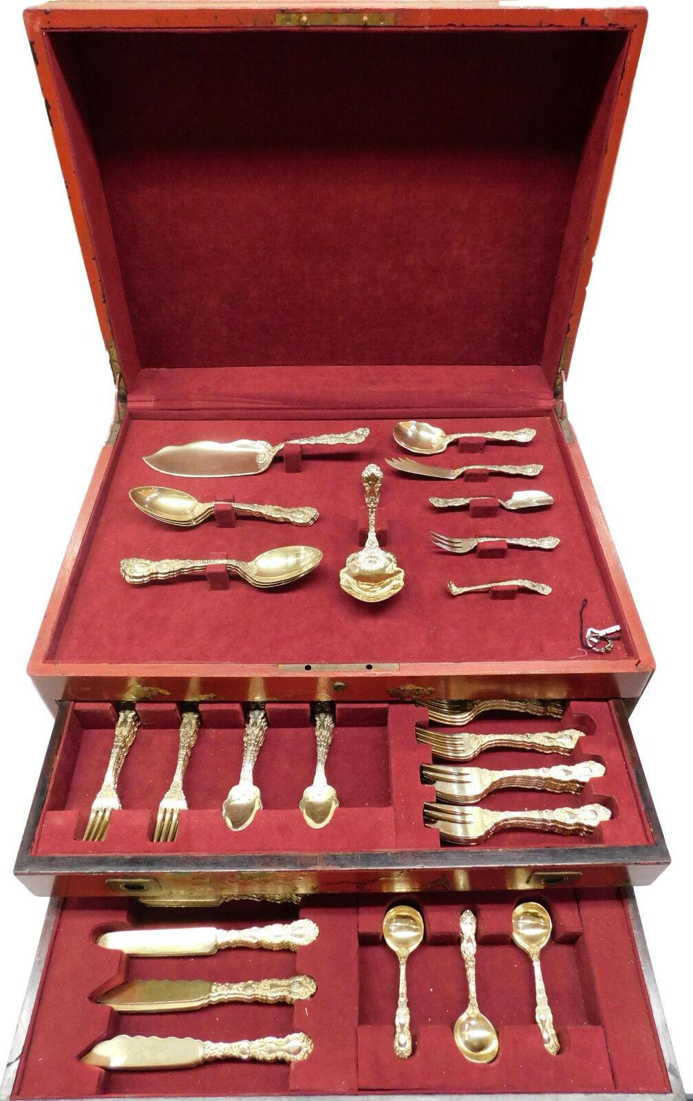 Monumental Imperial Chrysanthemum by Gorham Vermeil (completely gold washed) sterling silver flatware set, 157 pieces in the original vintage fitted chest. Chrysanthemum flowers run down both the back and front side of the handle with chrysanthemum